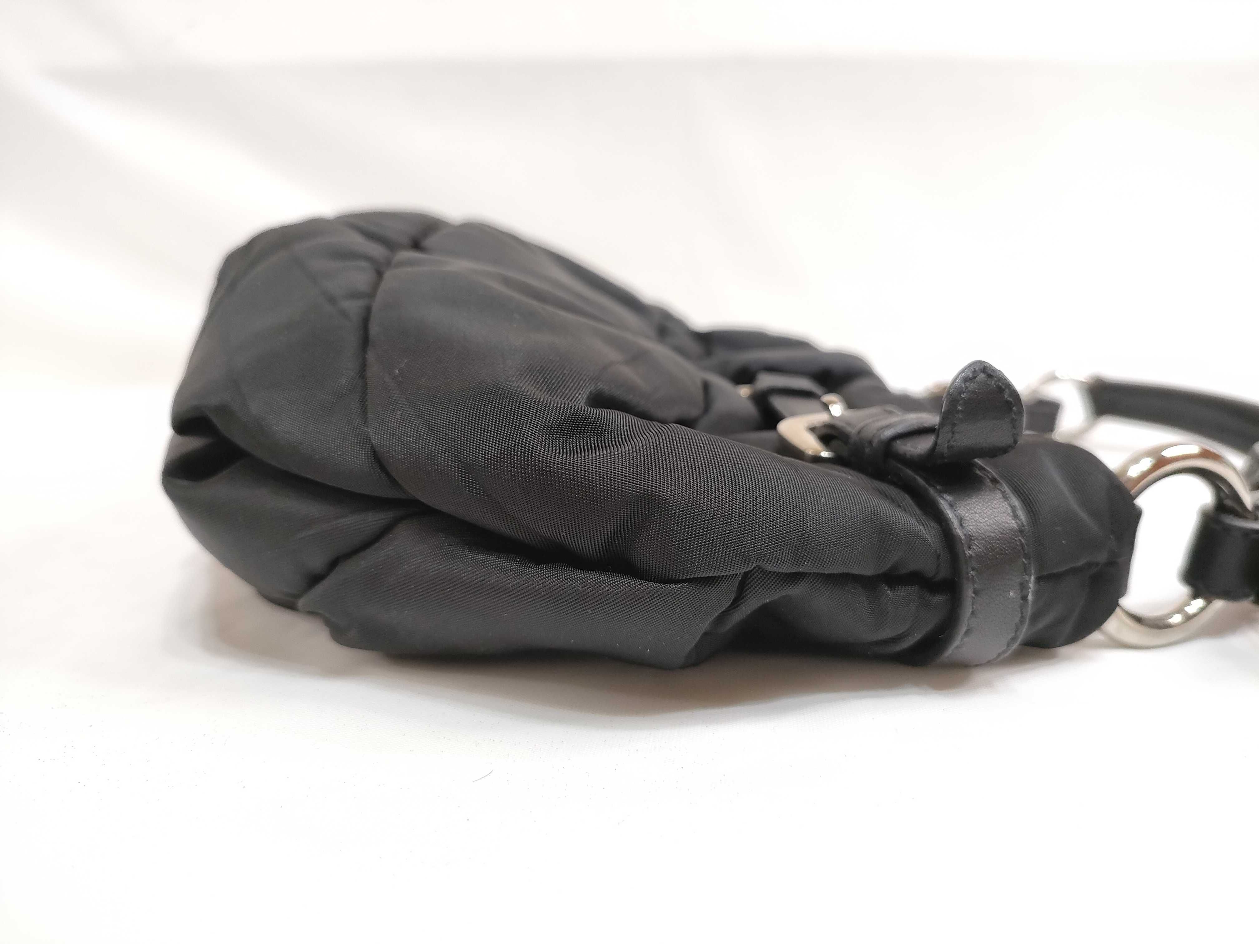 handbag with logo hardware, charm, dust bag, and shop card included. — view 7