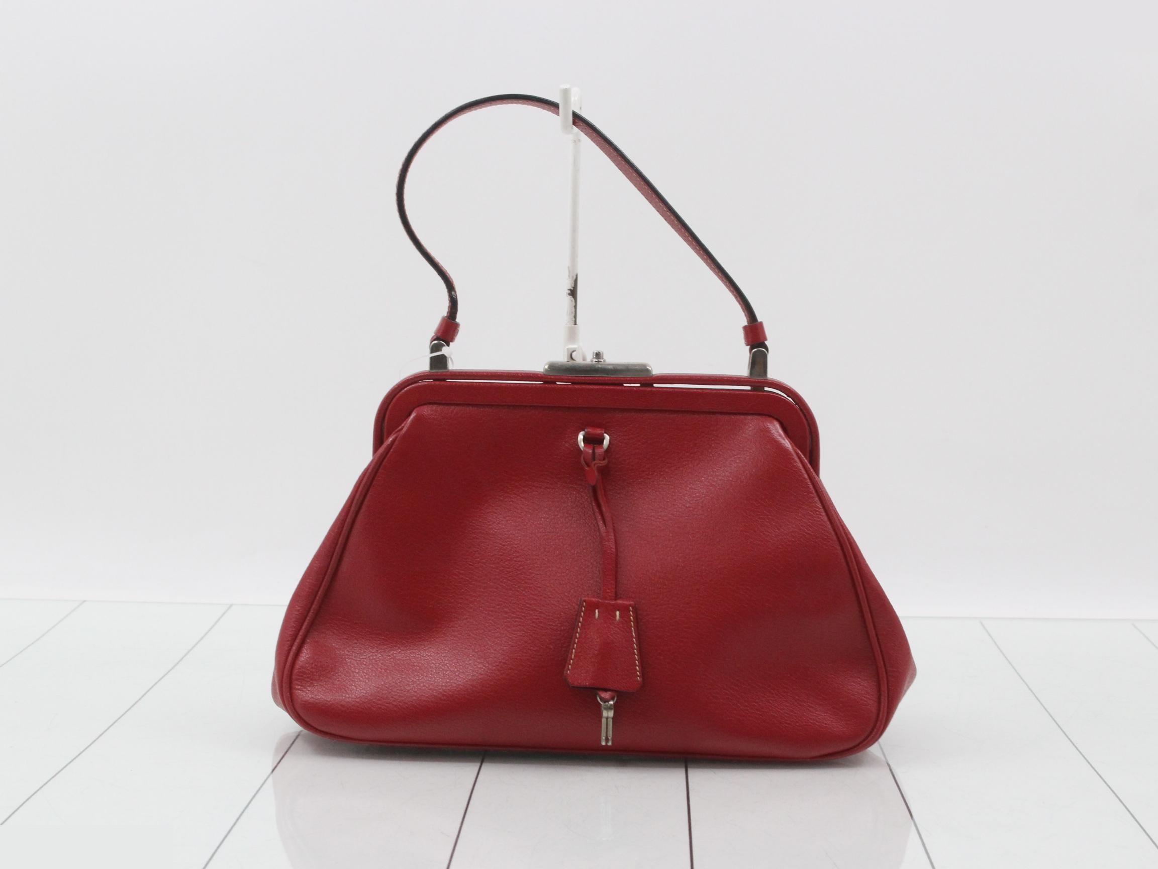 Clasp-closure bags and handbags
