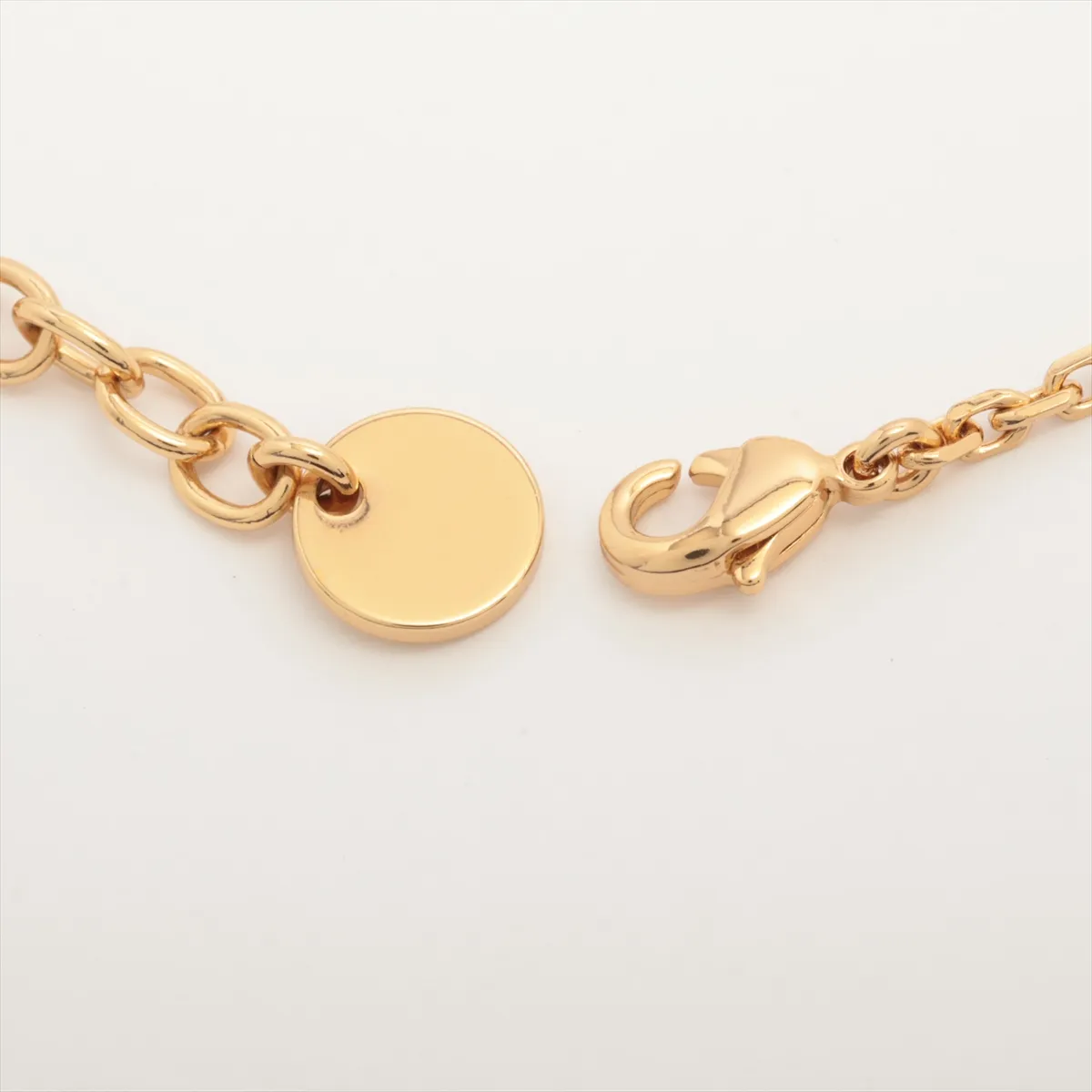 Petit CD bracelet, gold-plated with rhinestones. Shows signs of wear including — view 4