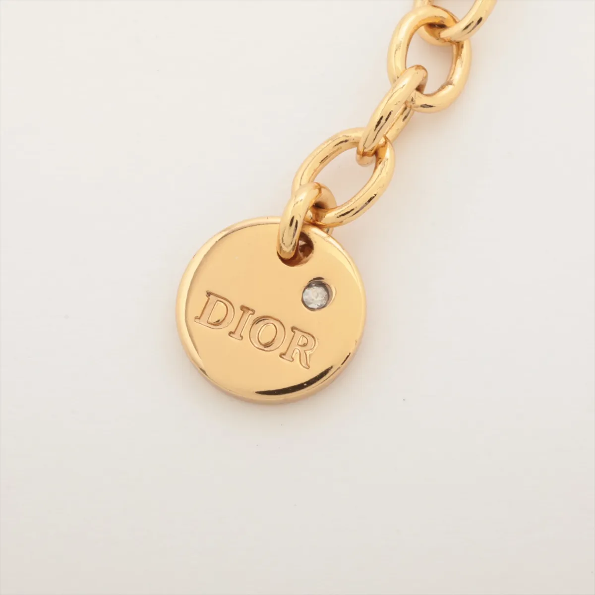 Petit CD bracelet, gold-plated with rhinestones. Shows signs of wear including — view 5