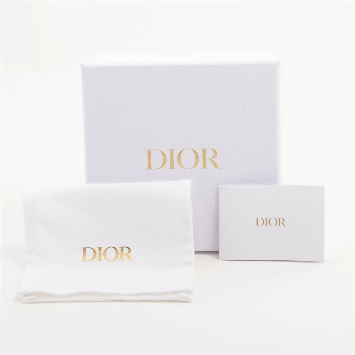 Petit CD bracelet, gold-plated with rhinestones. Shows signs of wear including — view 6