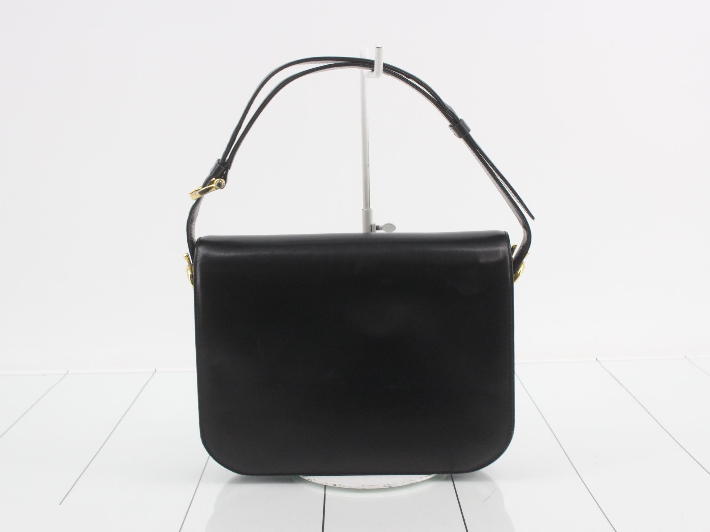 Vintage leather shoulder bag with carriage hardware — view 2
