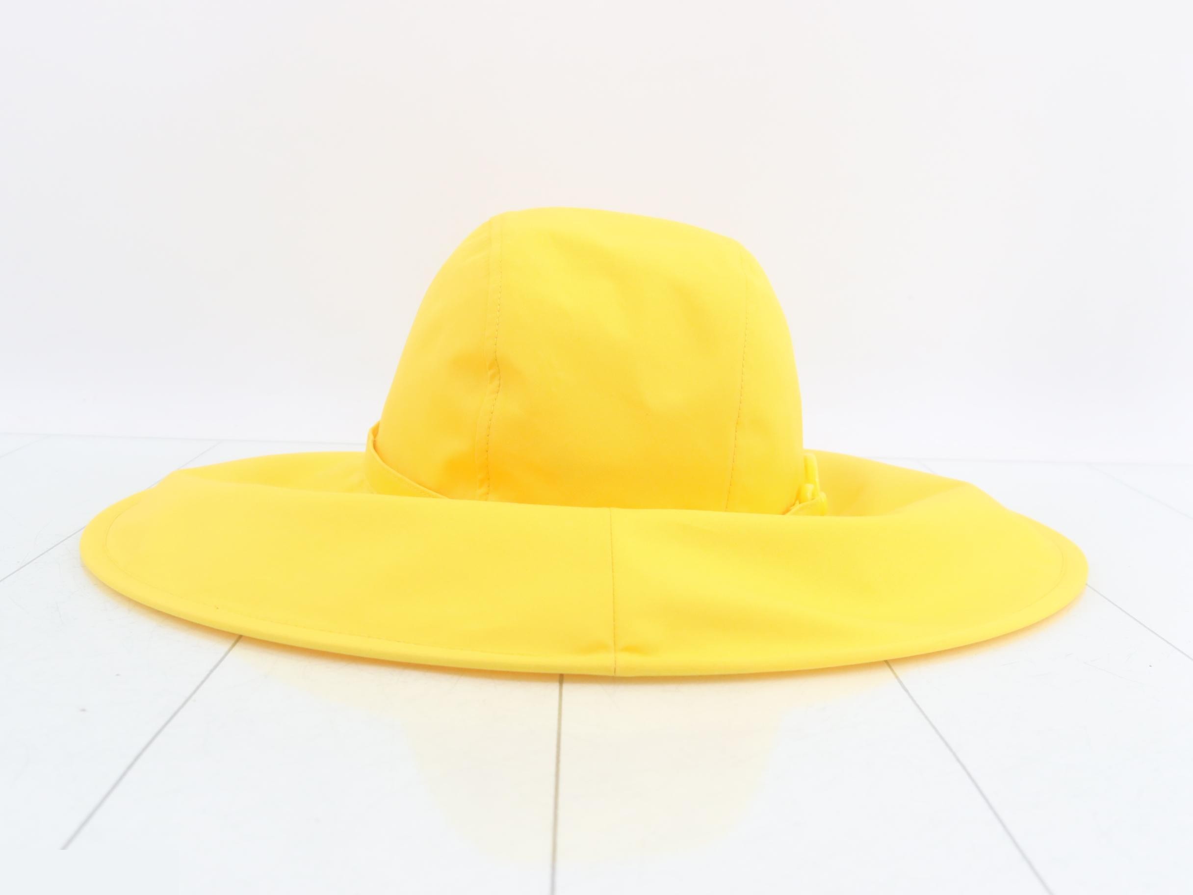 Large yellow hat — view 2