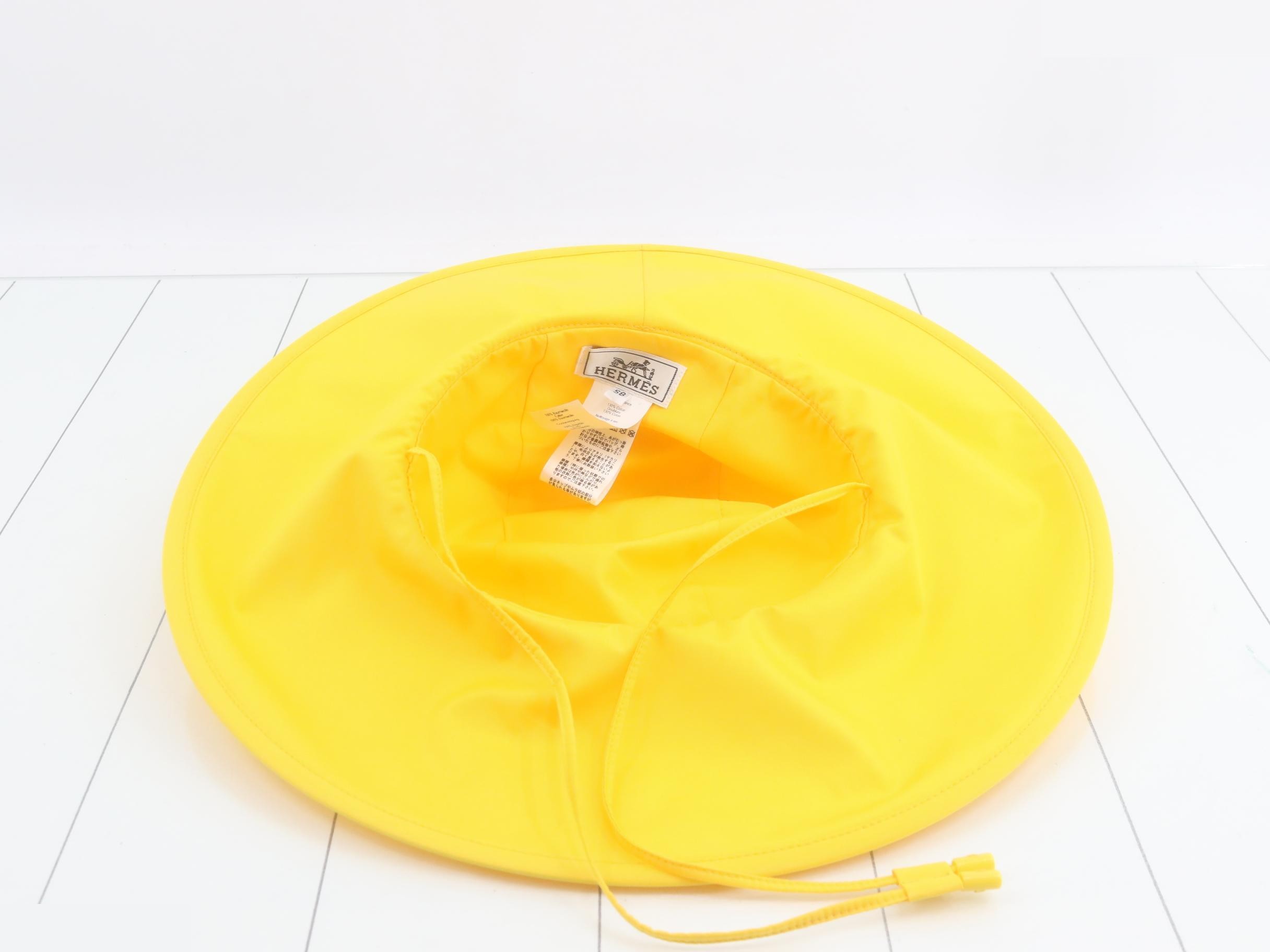 Large yellow hat — view 3