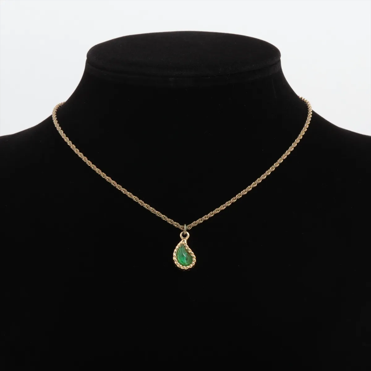 teardrop necklace, gold plated with colored stones, gold and green. Shows signs of wear, including — view 5