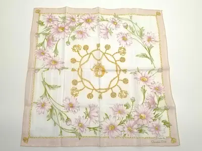 handkerchief scarf with sticker, emblem, logo chain, floral pattern, pink, and other accessories.