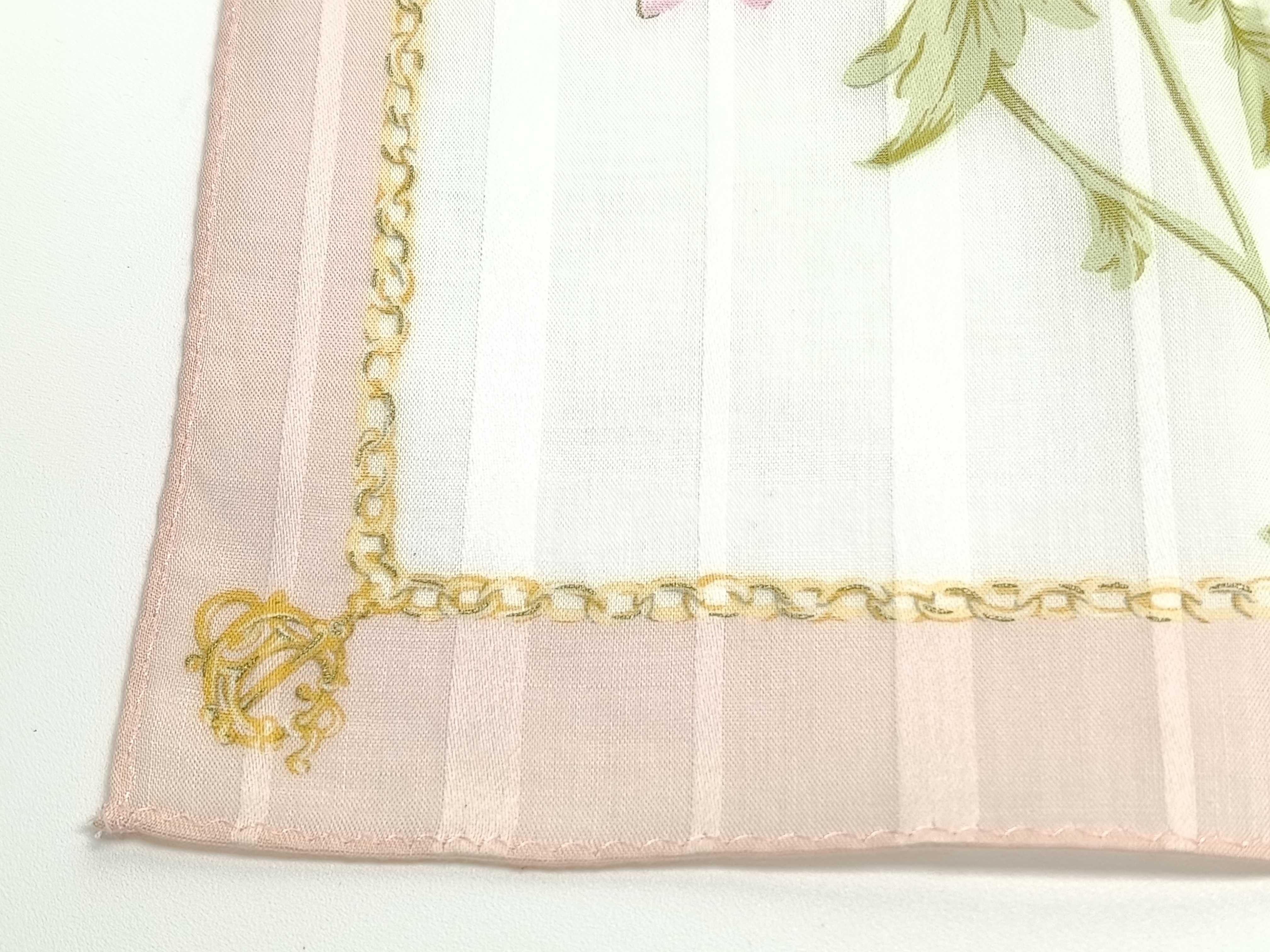 handkerchief scarf with sticker, emblem, logo chain, floral pattern, pink, and other accessories. — view 4