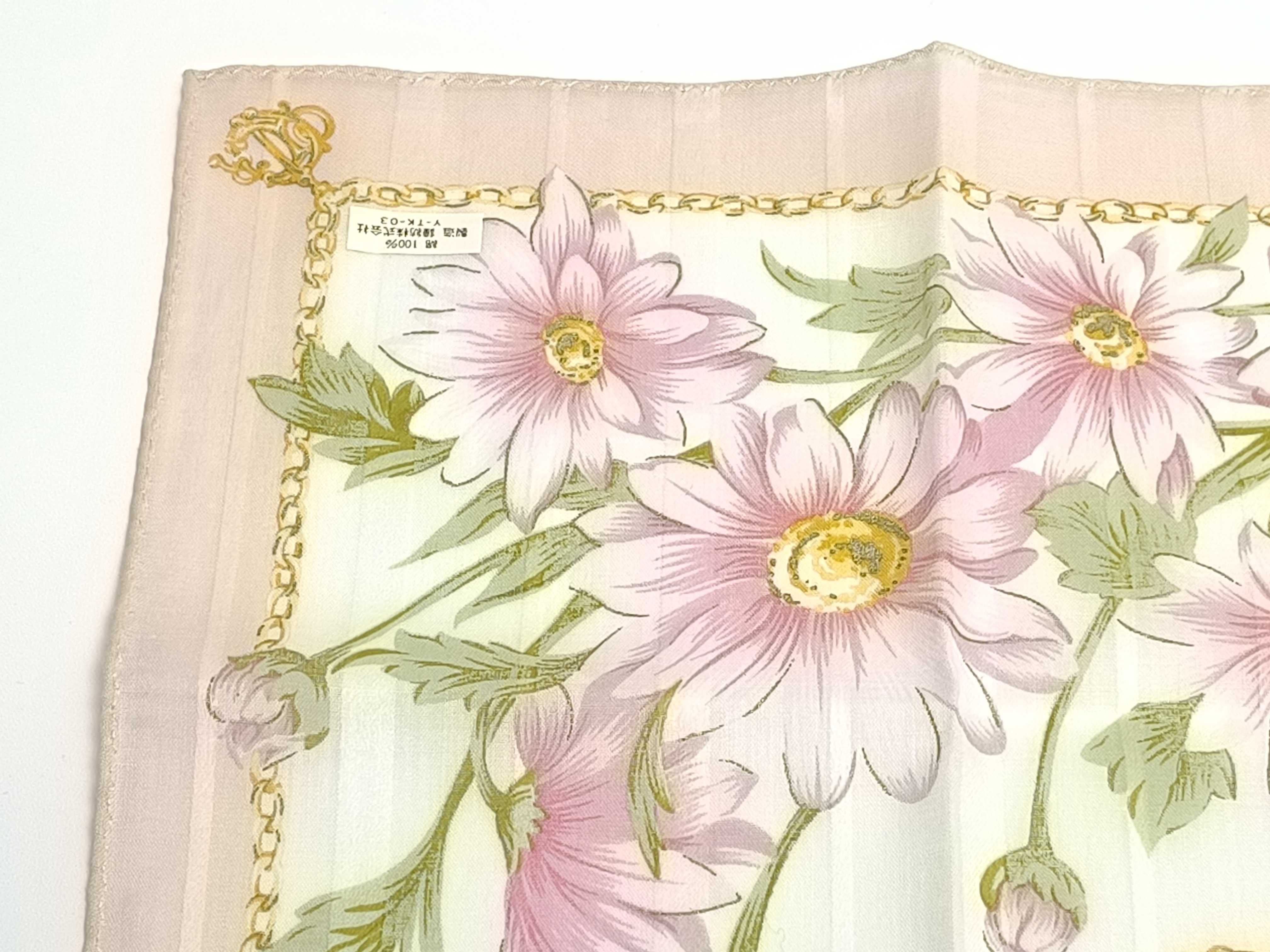 handkerchief scarf with sticker, emblem, logo chain, floral pattern, pink, and other accessories. — view 6