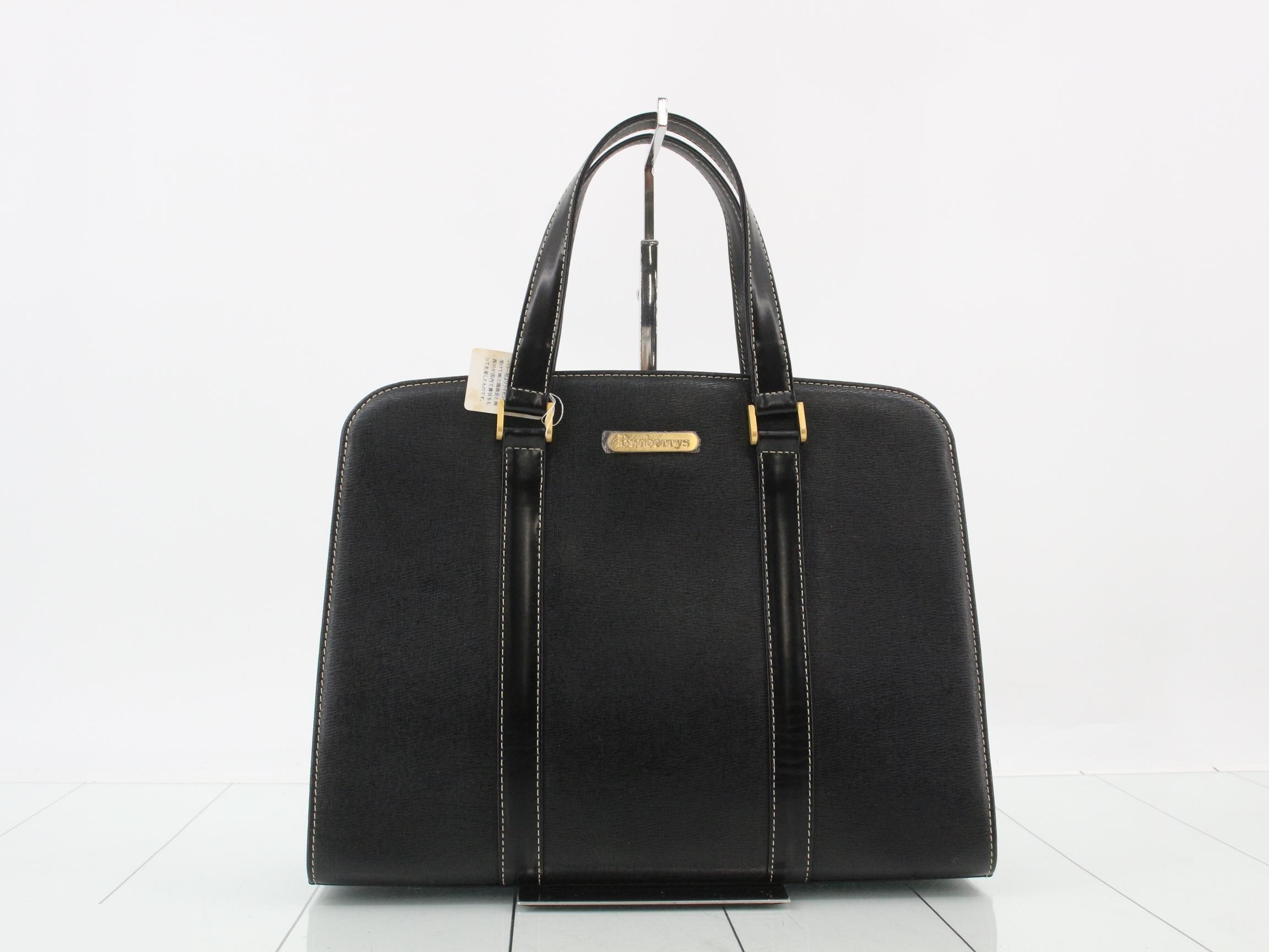 Leather handbag, Nova check lining, unused.