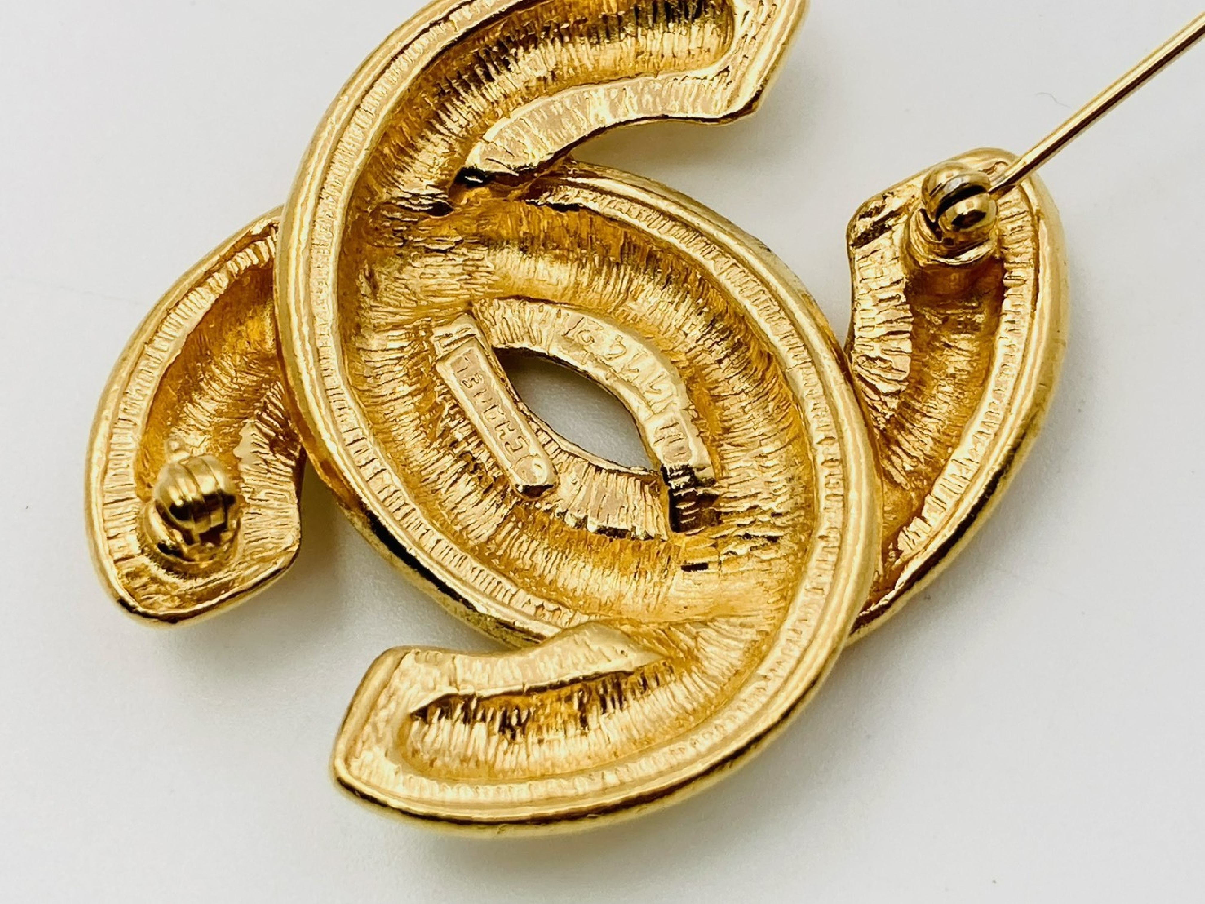 Coco Mark Matelassé Brooch, stamped 1142. — view 3