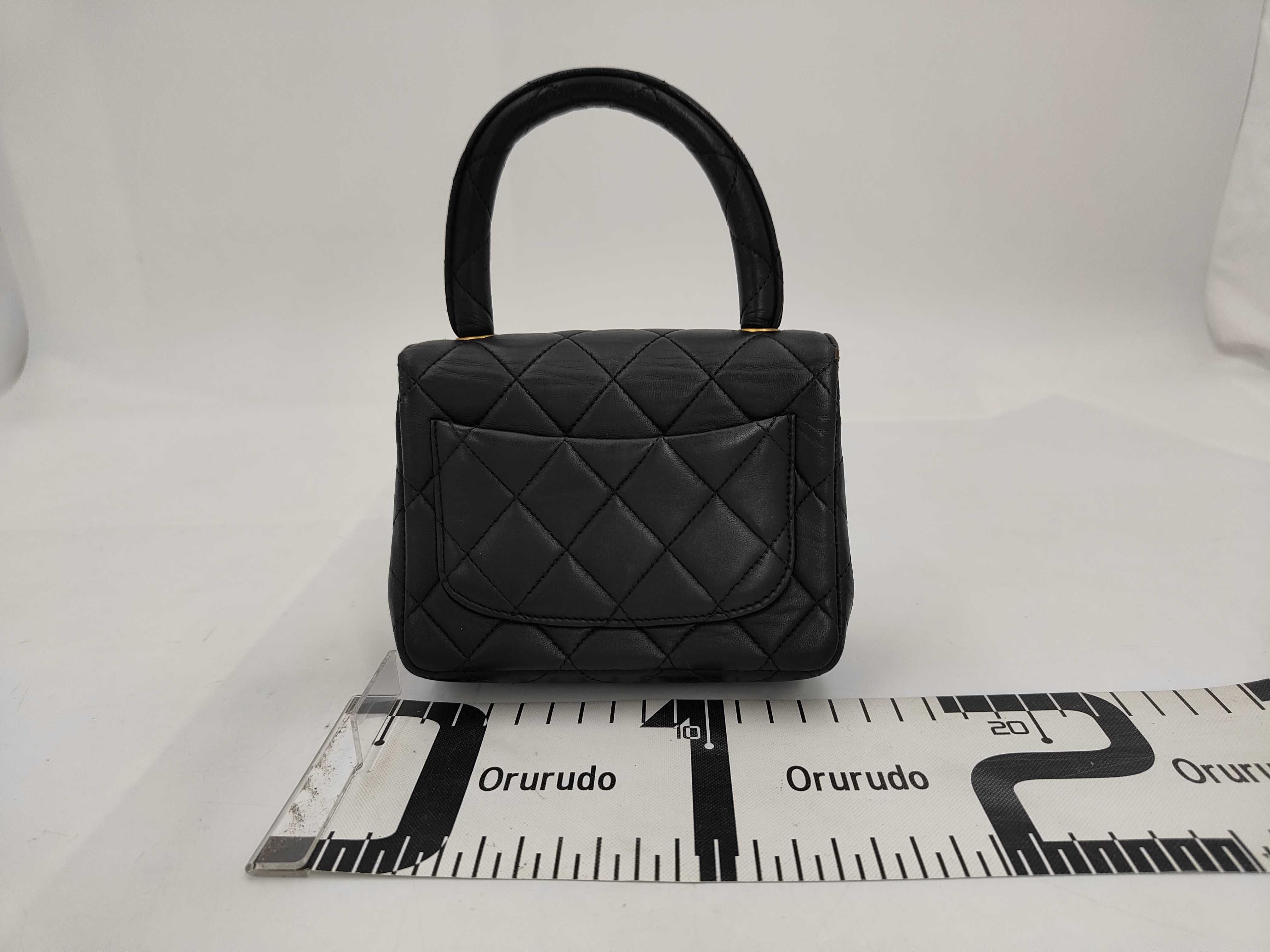 Top Handle Matelassé Black Gold Handbag — view 2