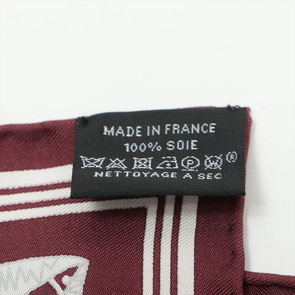 Hermès Carre 55 "Les Canyons Etoiles" (From the Canyons to the Stars) Silk Scarf, Bordeaux, Slight wear and tear. — view 6