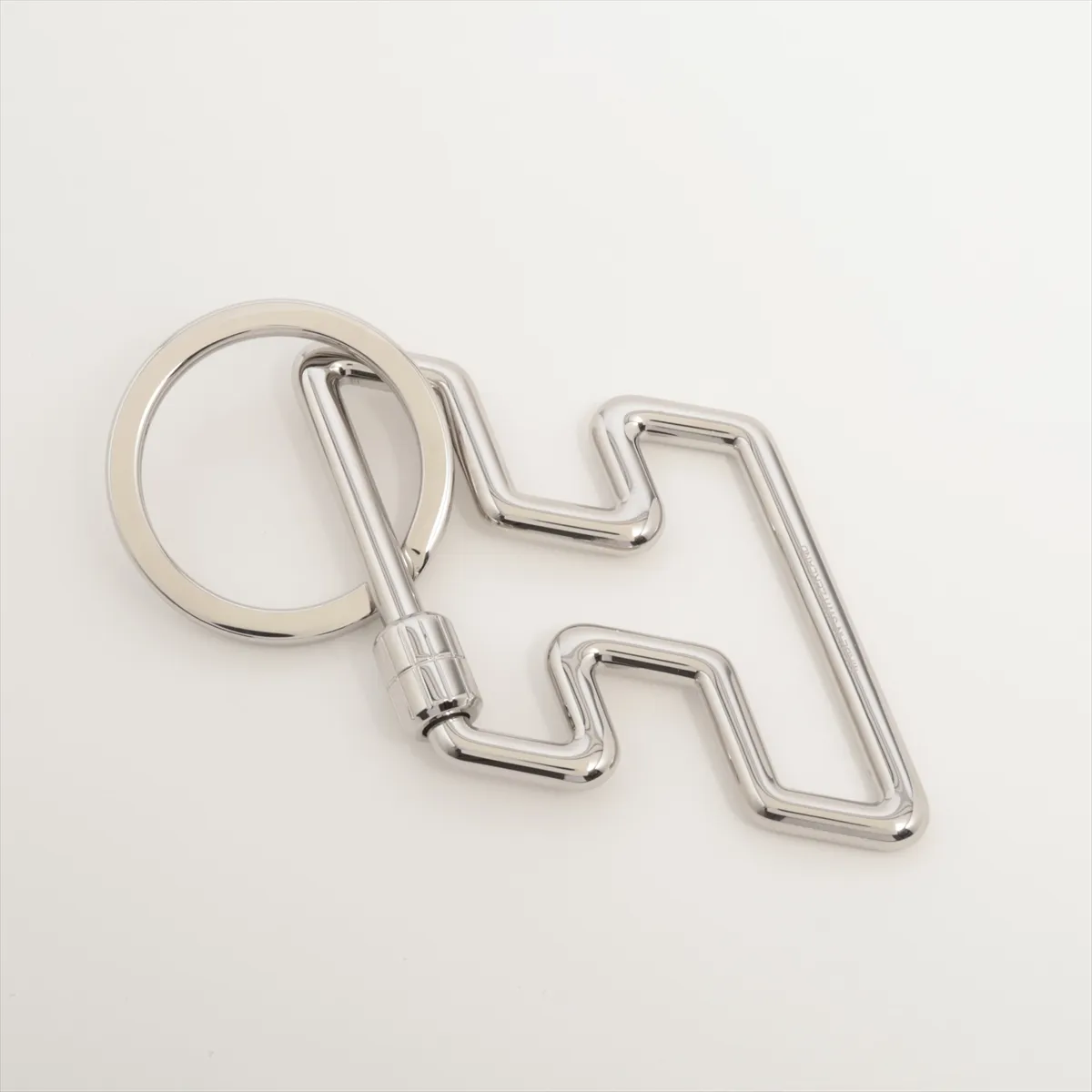 H-Two Speed ​​Keyring, GP Silver. Shows signs of wear including — view 2