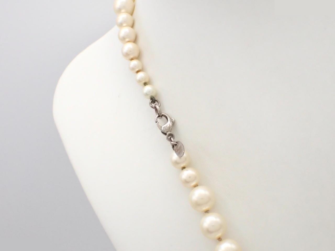 Long pearl necklace with Coco Chanel logo, approximately 90cm in length. — view 2