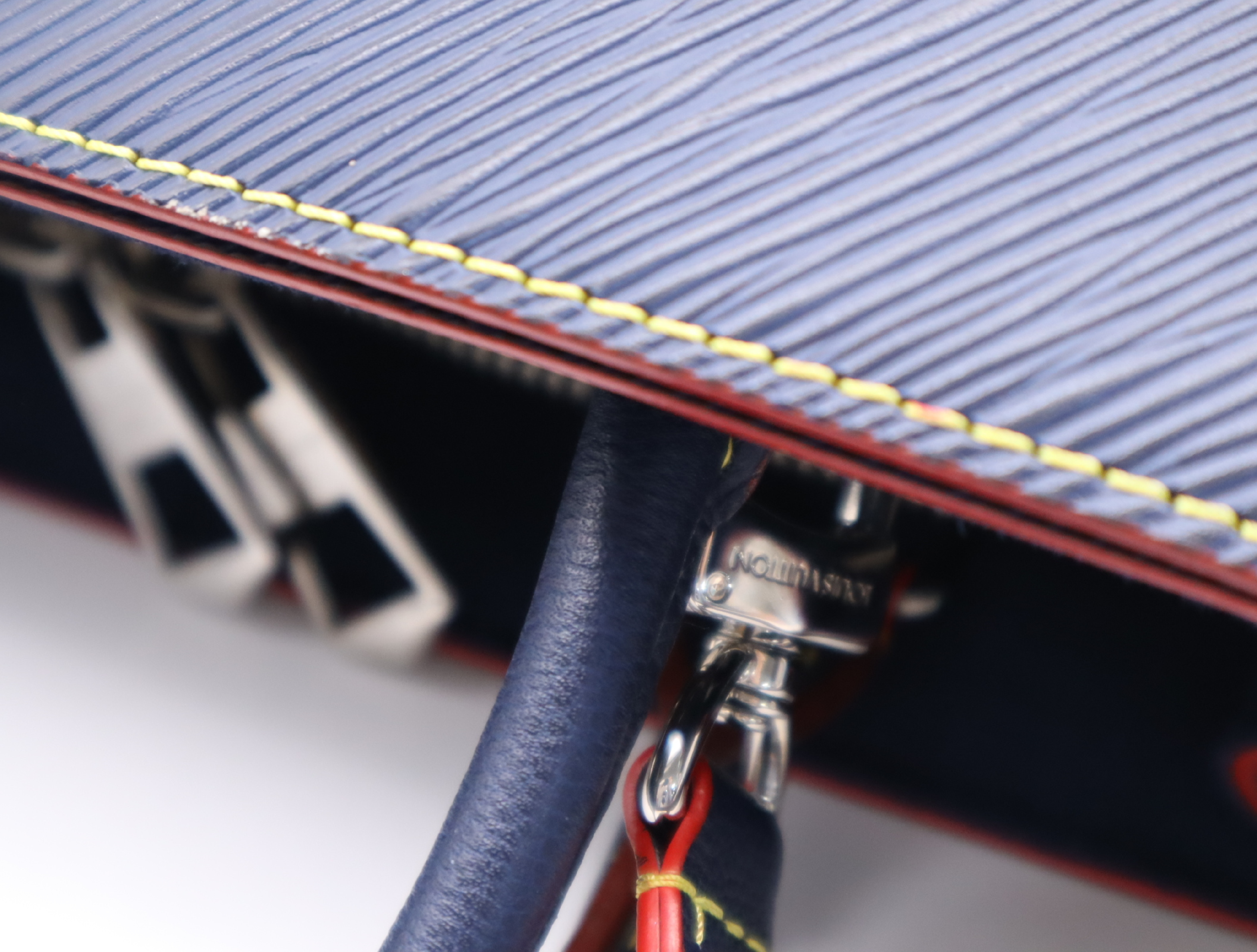 M54980 Epi Twist Tote Indigo Blue Handbag with Shoulder Strap and Clochette — view 10