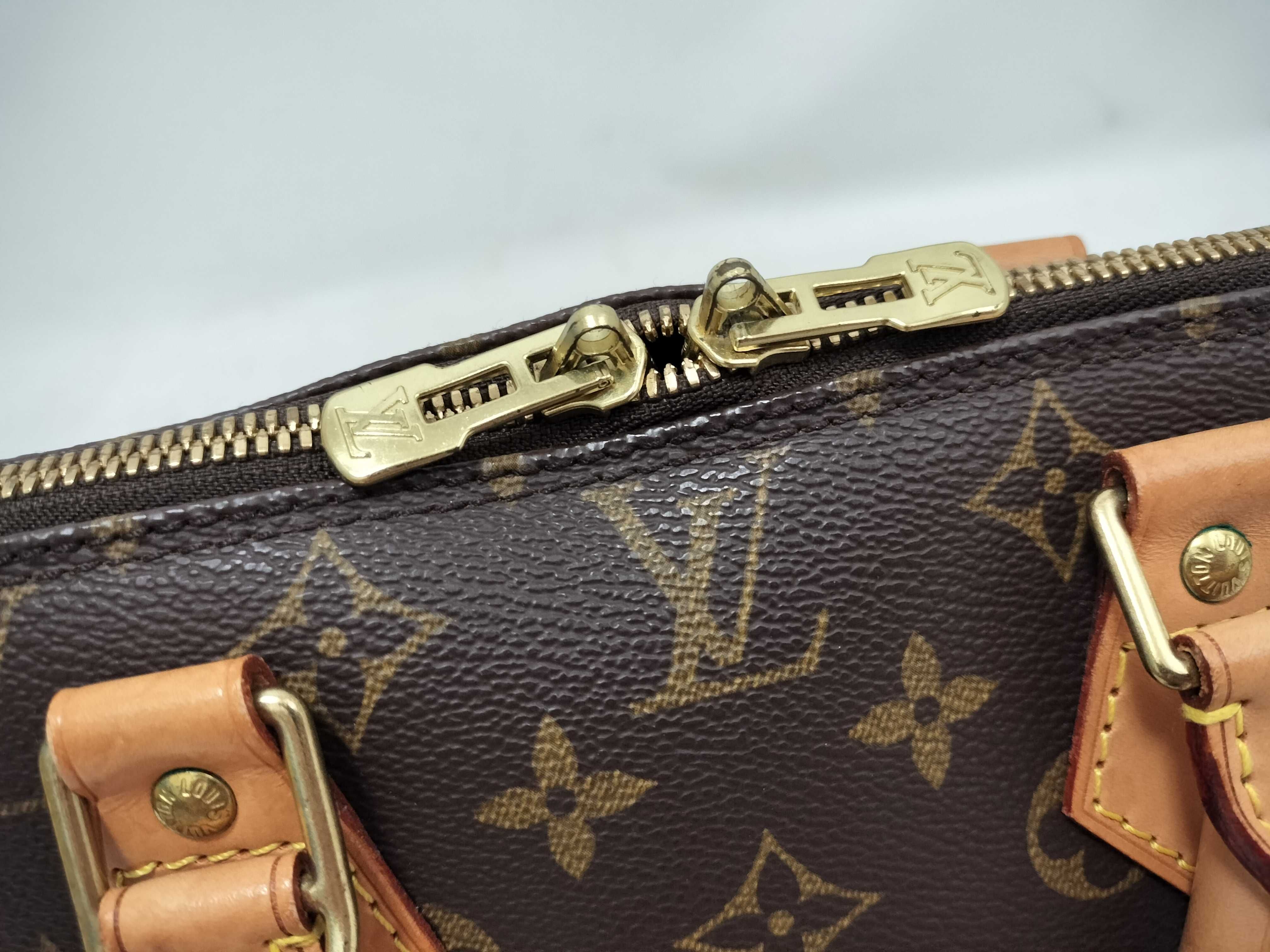 Monogram Alma M51130 Handbag — view 13