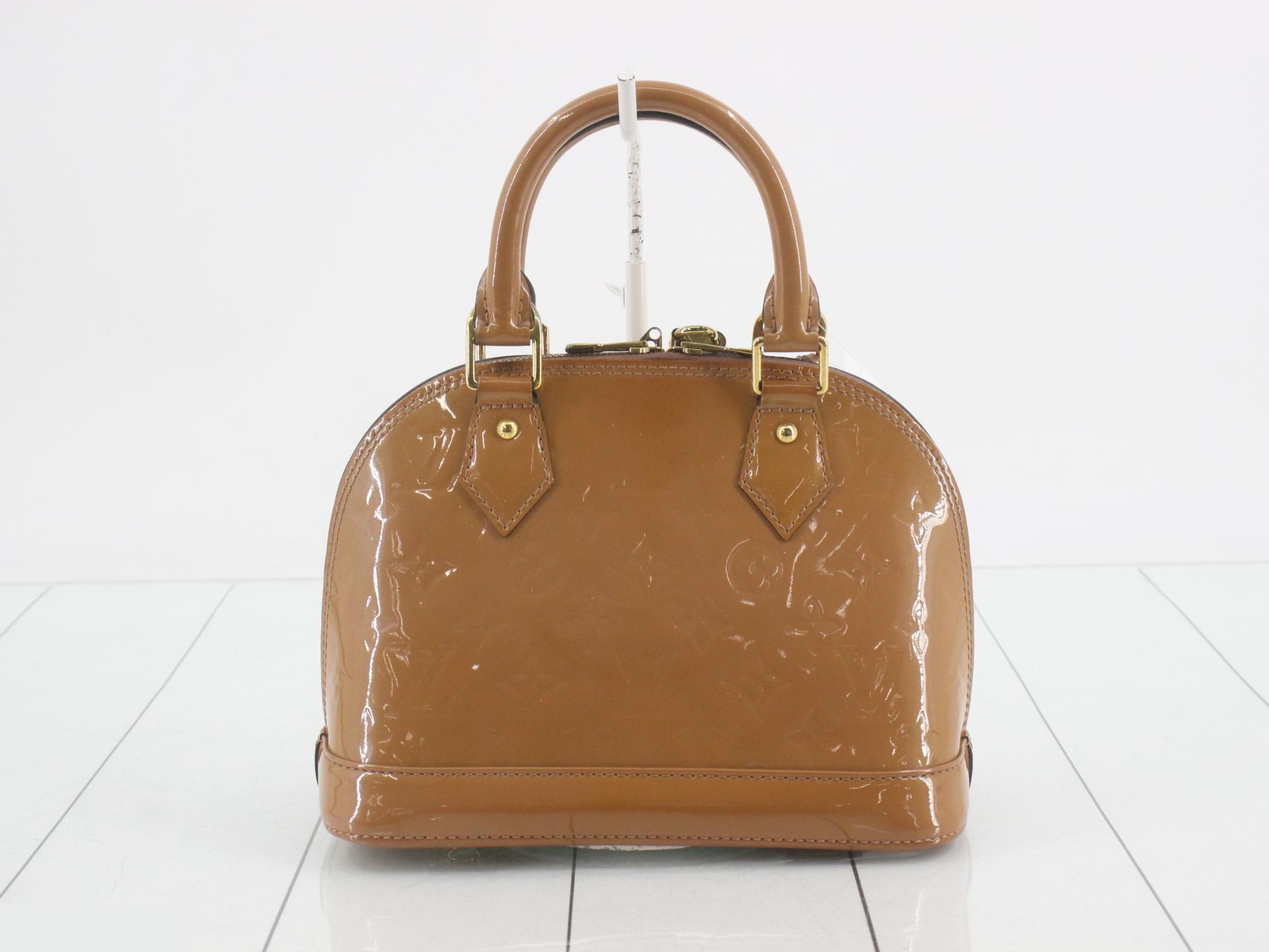 Alma BB handbag with strap, Vernis Monogram. — view 2