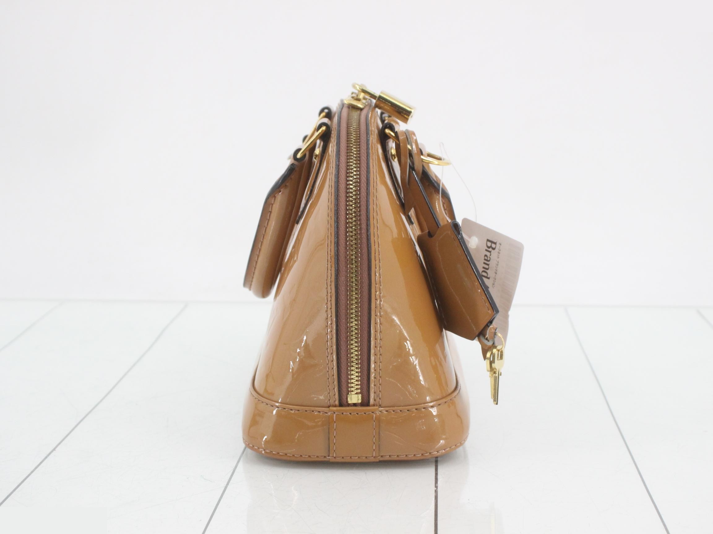 Alma BB handbag with strap, Vernis Monogram. — view 4