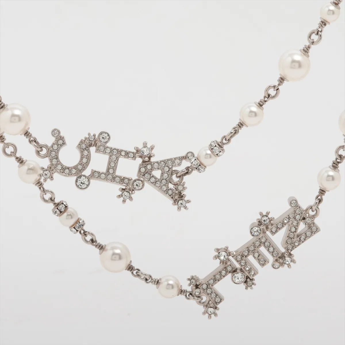 logo F23P long necklace, metal x rhinestone x faux pearl, silver. Shows wear, tarnish, and stains. — view 2