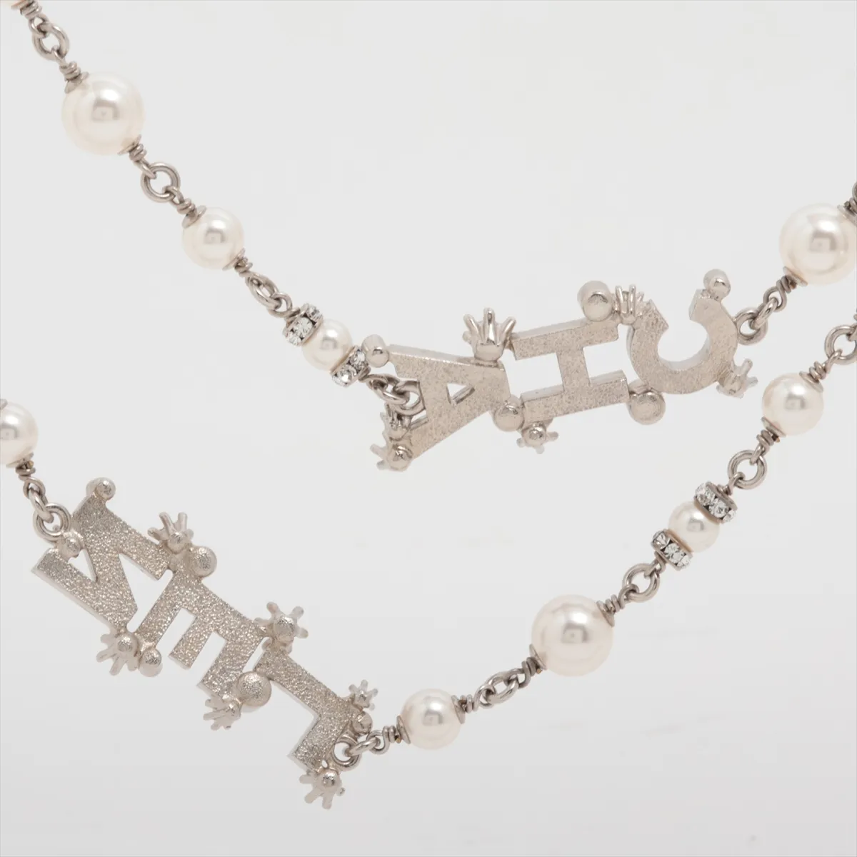 logo F23P long necklace, metal x rhinestone x faux pearl, silver. Shows wear, tarnish, and stains. — view 3