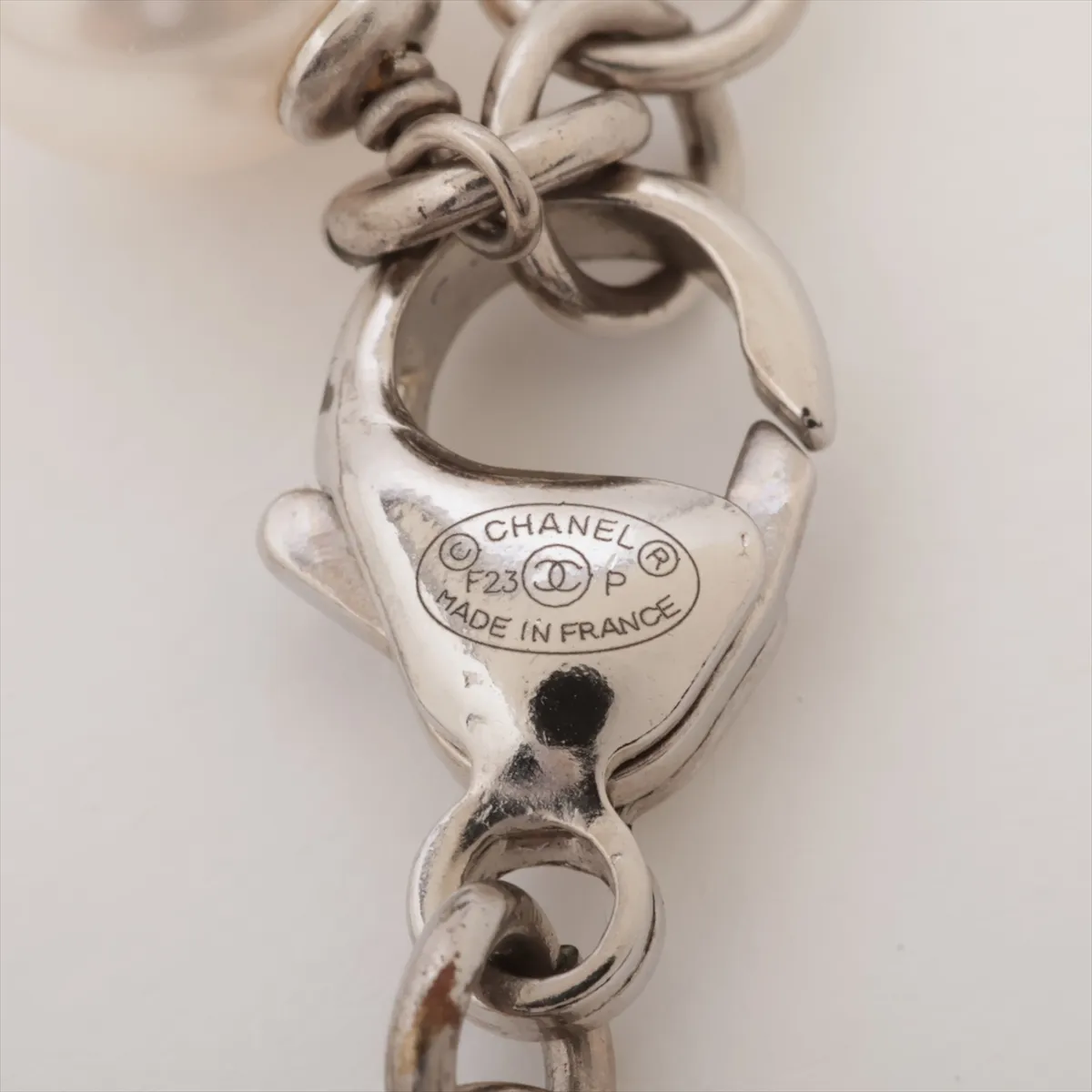 logo F23P long necklace, metal x rhinestone x faux pearl, silver. Shows wear, tarnish, and stains. — view 5