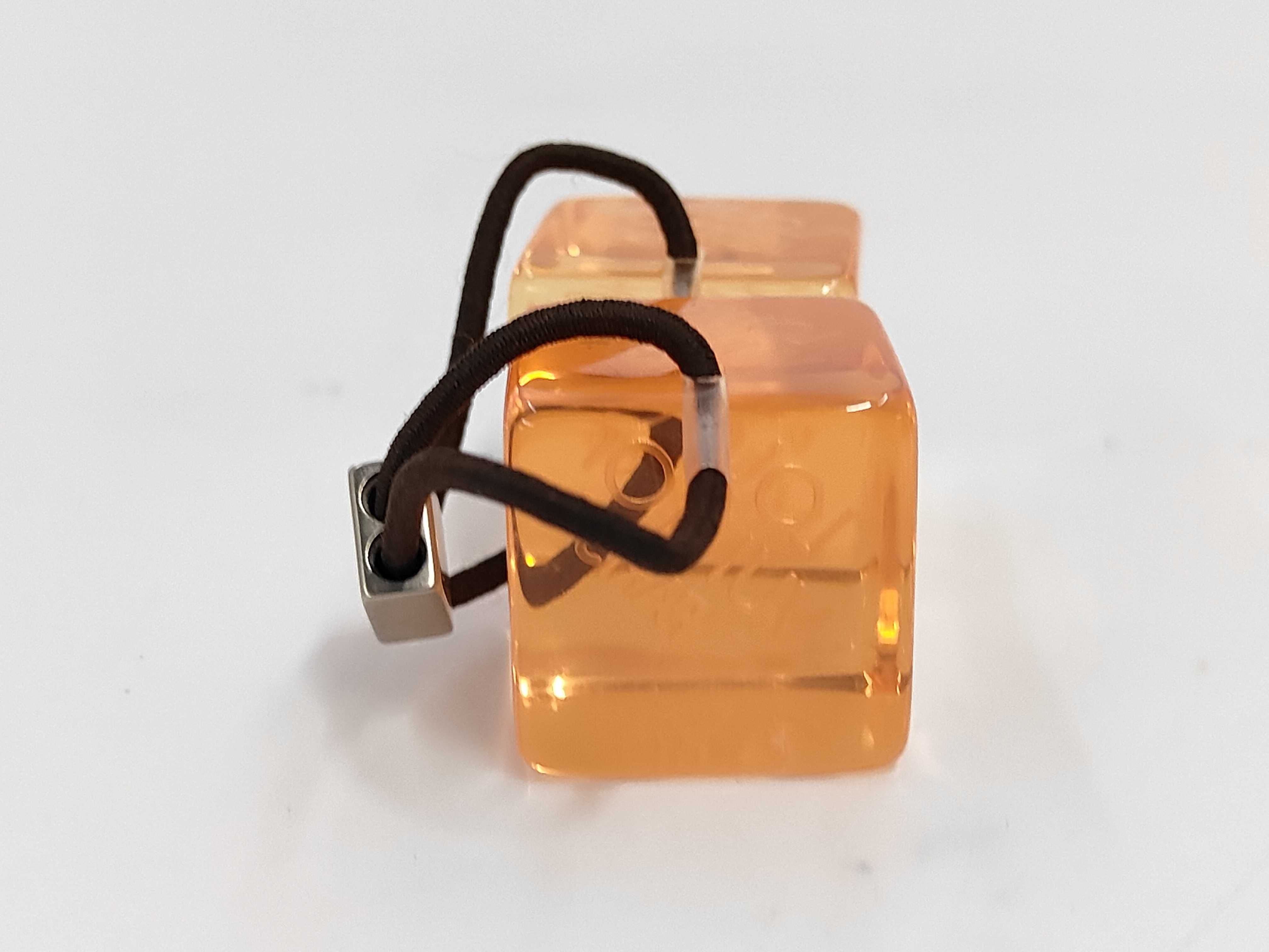 Inclusion Hair Cube Hair Tie Orange Hair Accessory — view 3
