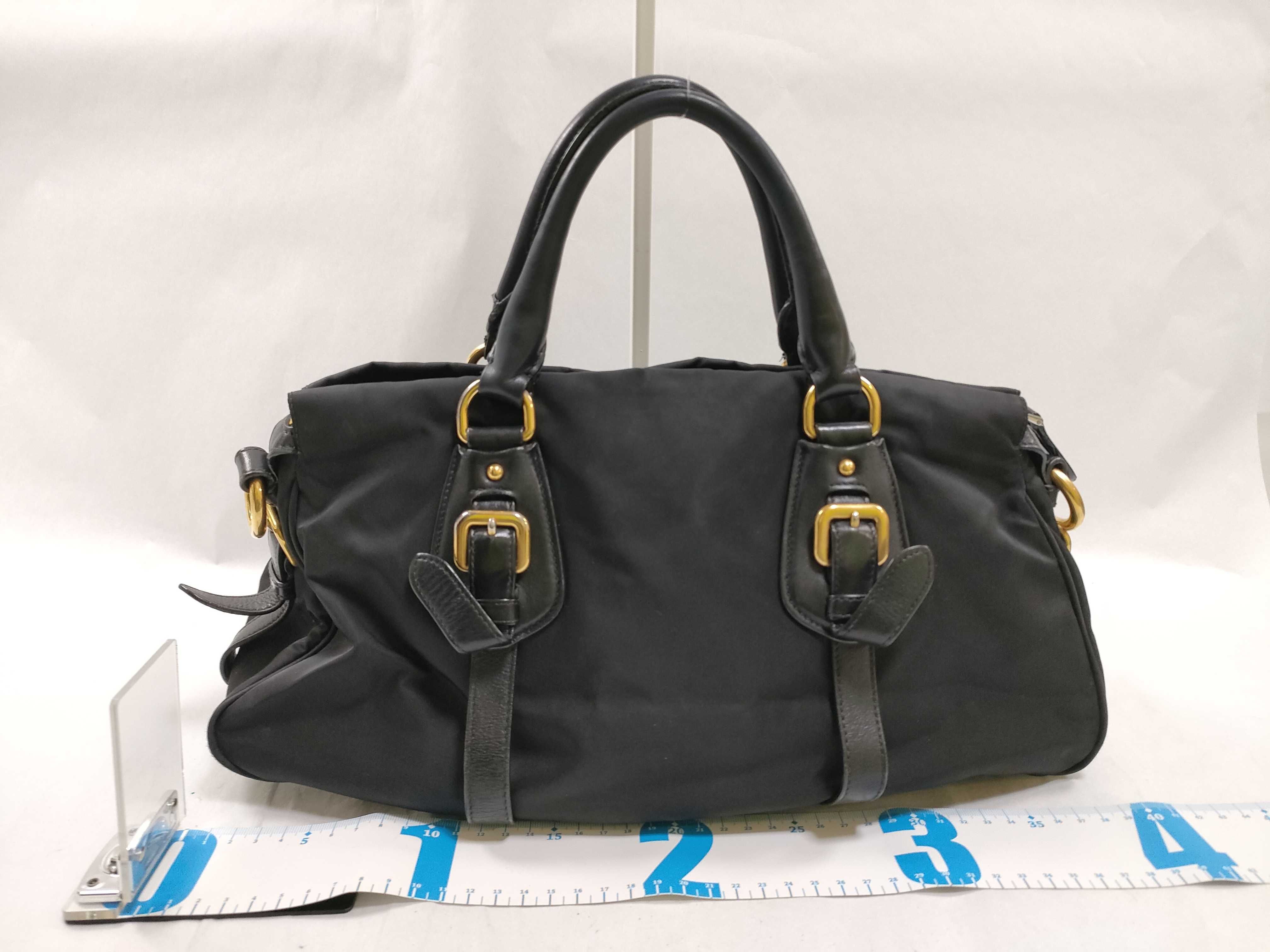 handbag, triangular logo, black handbag — view 2