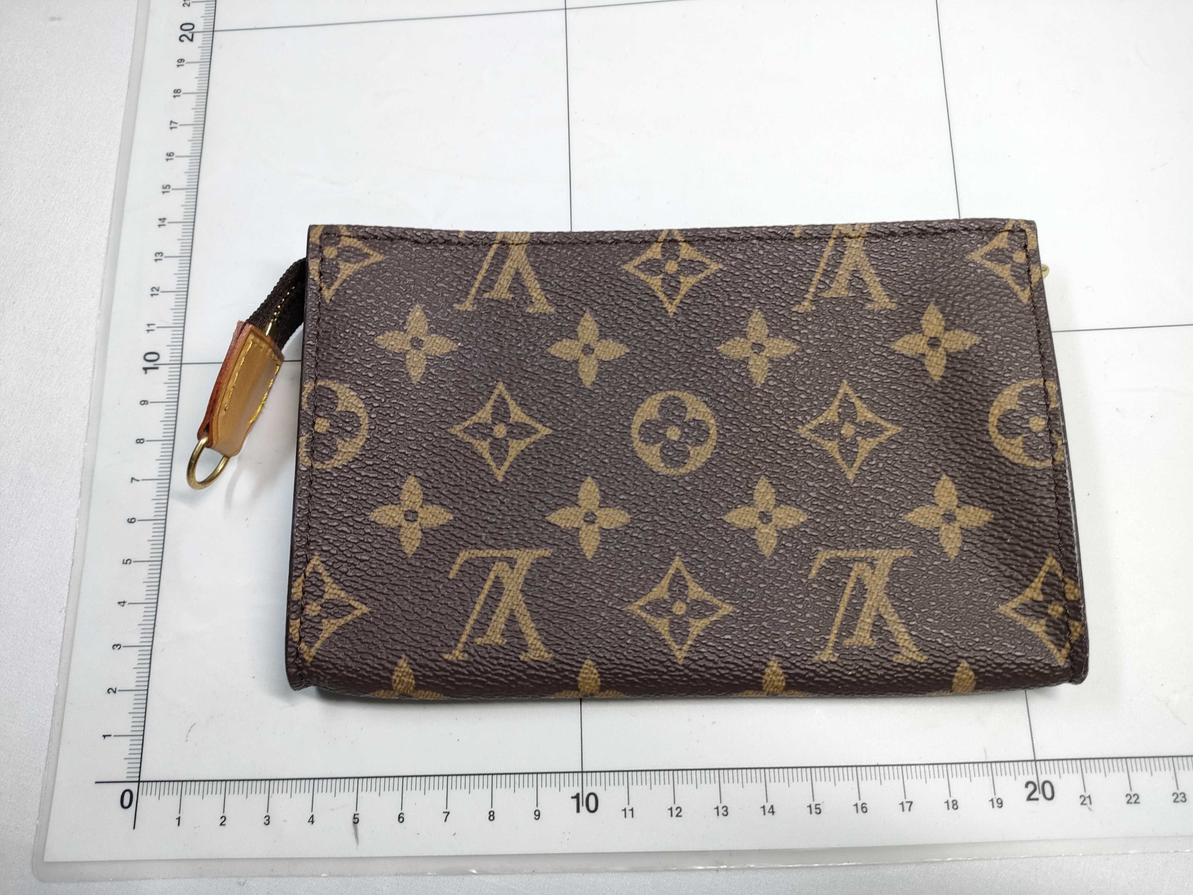 Monogram Bucket Pouch and other accessories — view 2