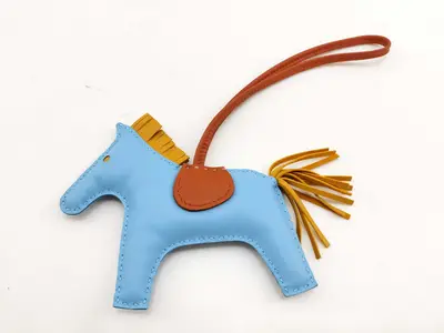 Agneau Milo Rodeo Charm, A AM stamp, Blue Caramel Charm