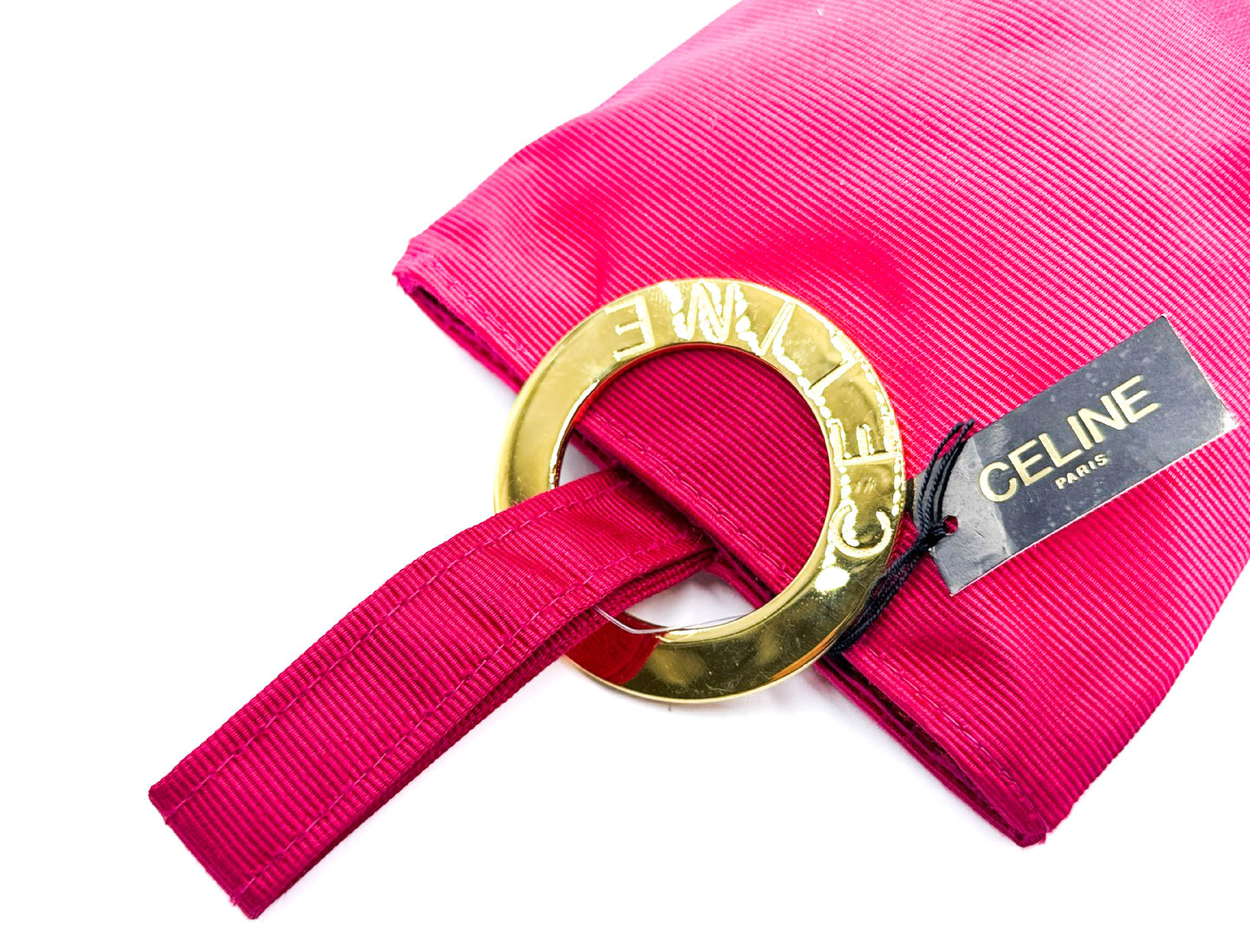 pink handbag with circle clasp and gold hardware, with tags. — view 2