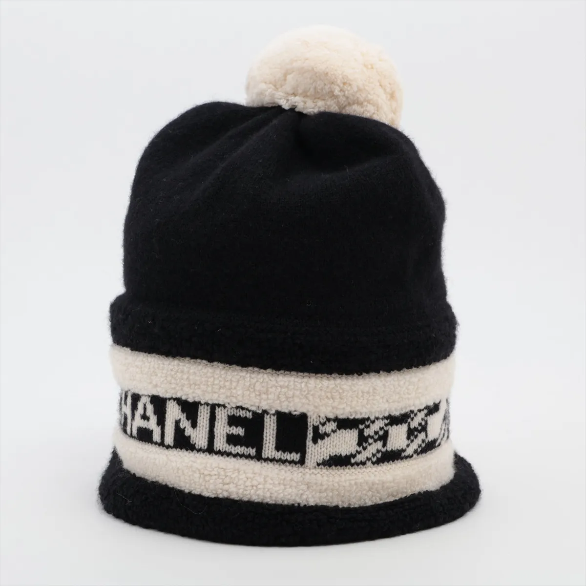 logo 20K cashmere knit cap, black and white. Shows wear,