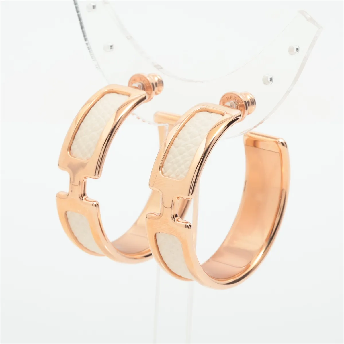 Olympe hoop earrings, GP x leather, rose gold x ivory. Shows wear, tarnishing,