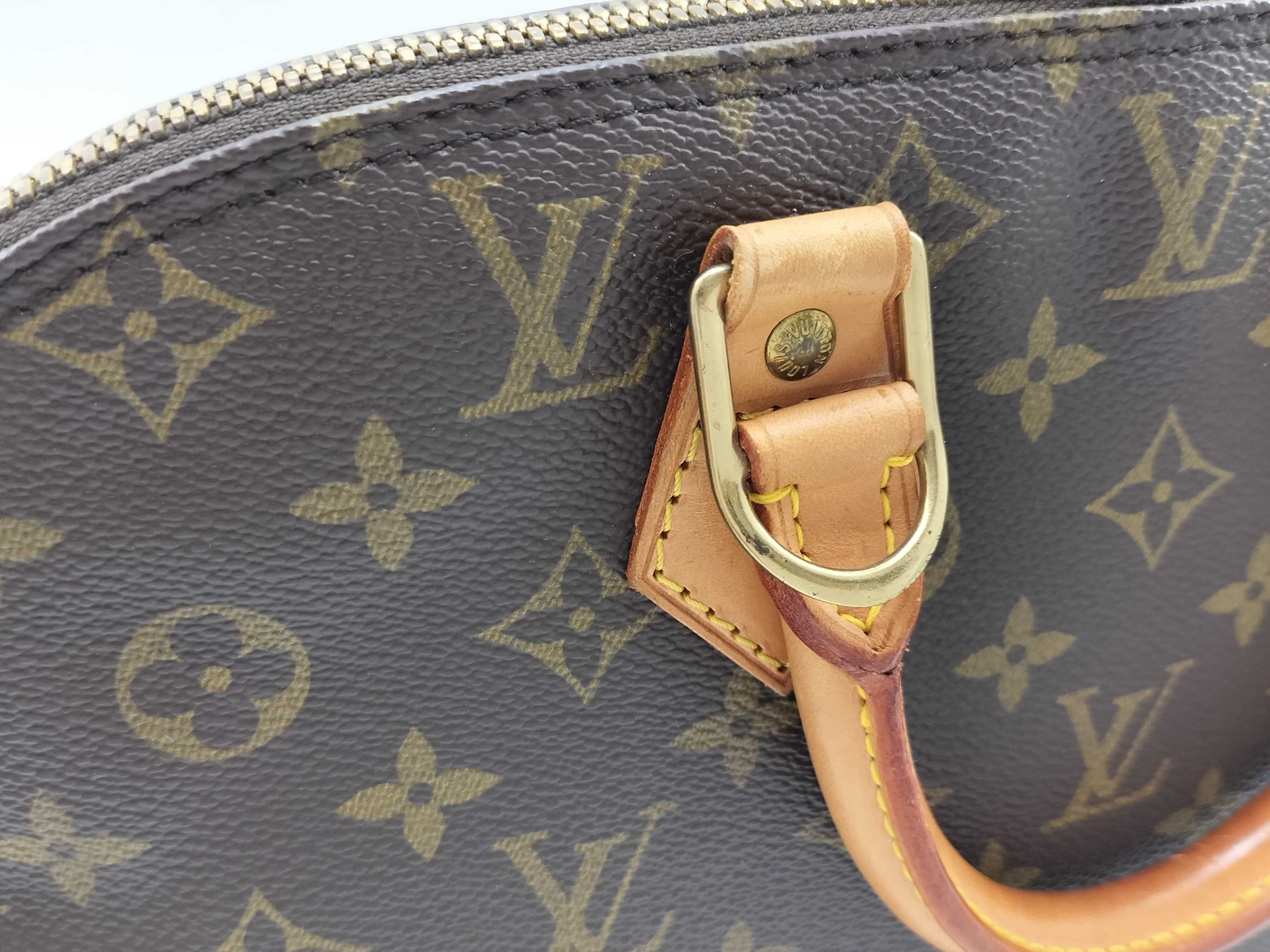 Monogram Alma M51130 VI0975 Handbag — view 11