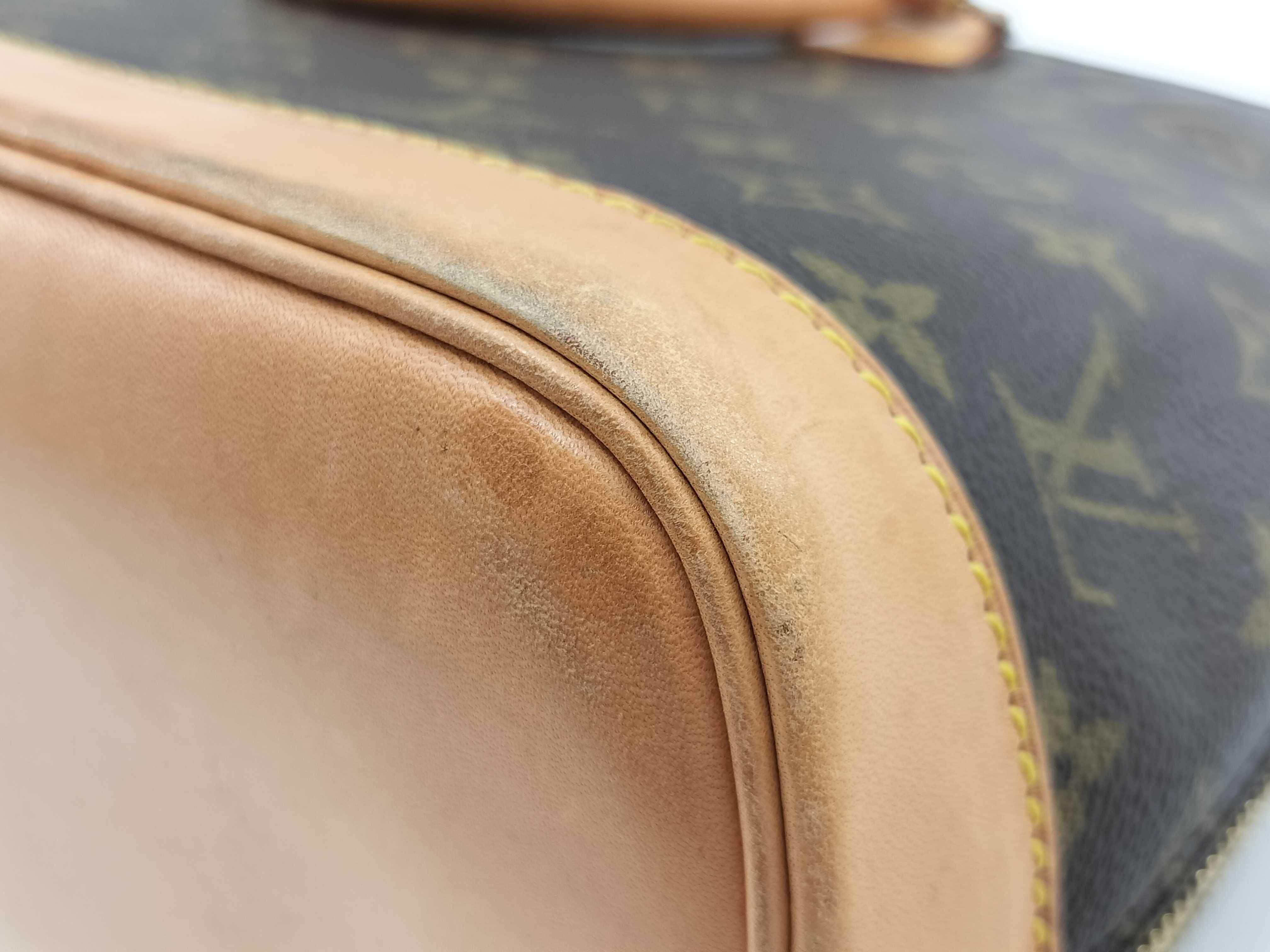 Monogram Alma M51130 VI0975 Handbag — view 9