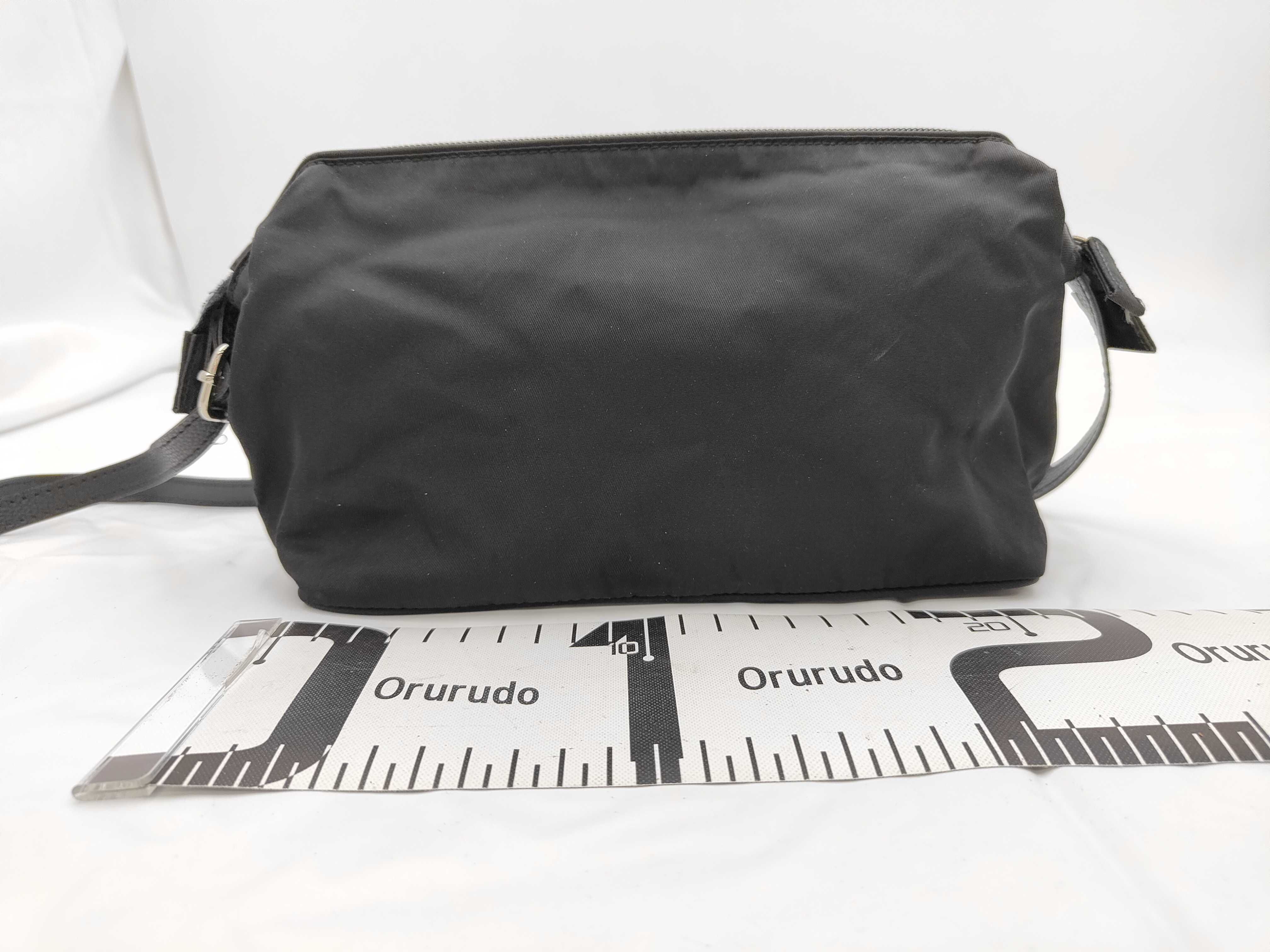 black pouch, with accessories, shoulder bag. — view 2