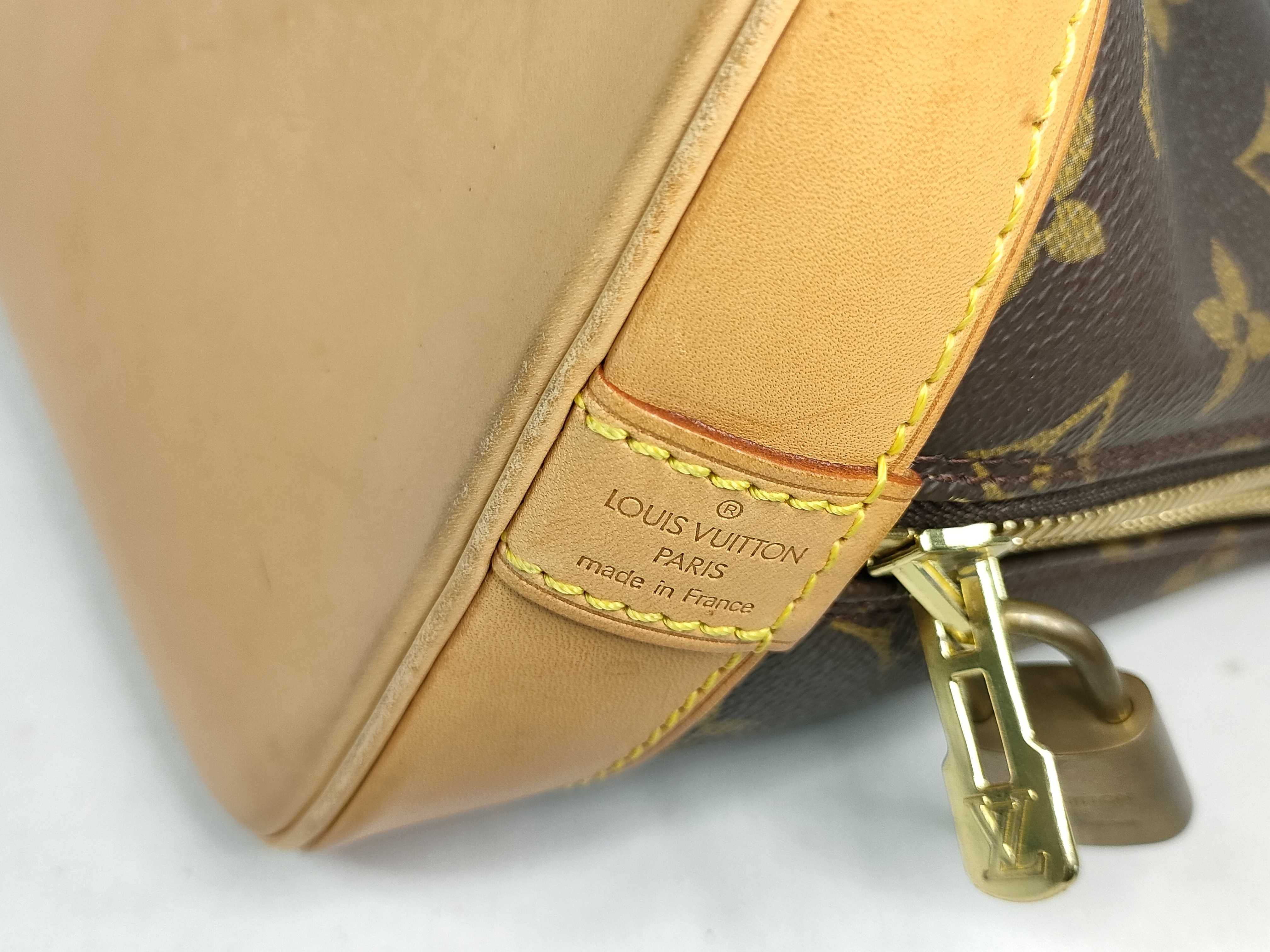 Monogram M51130 FL0011 Alma Handbag — view 12