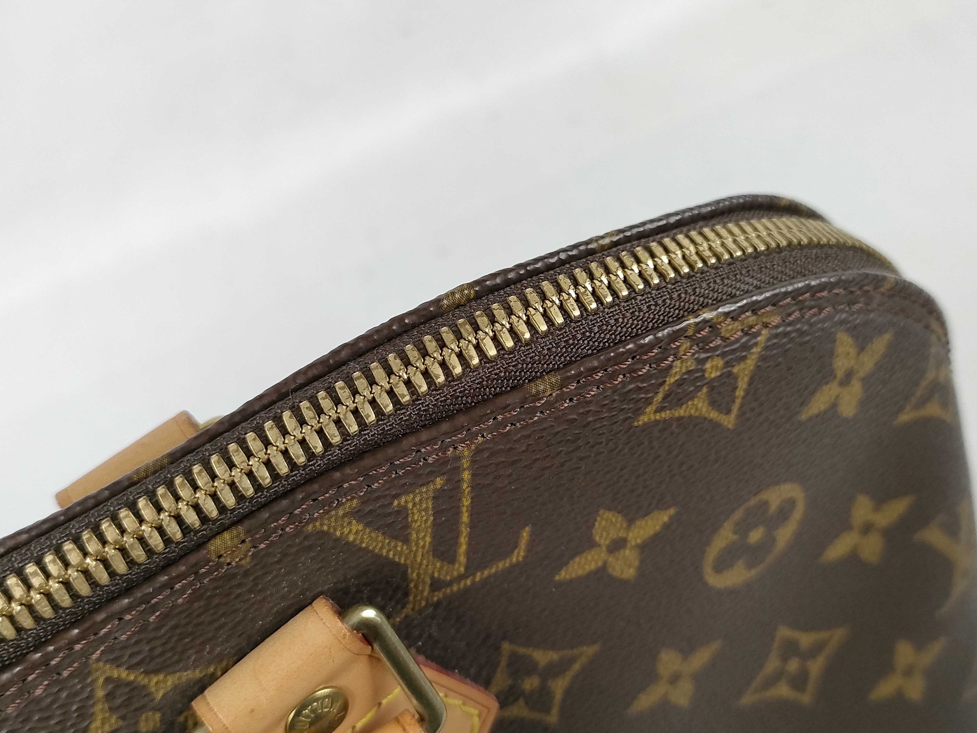 Monogram M51130 FL0011 Alma Handbag — view 8