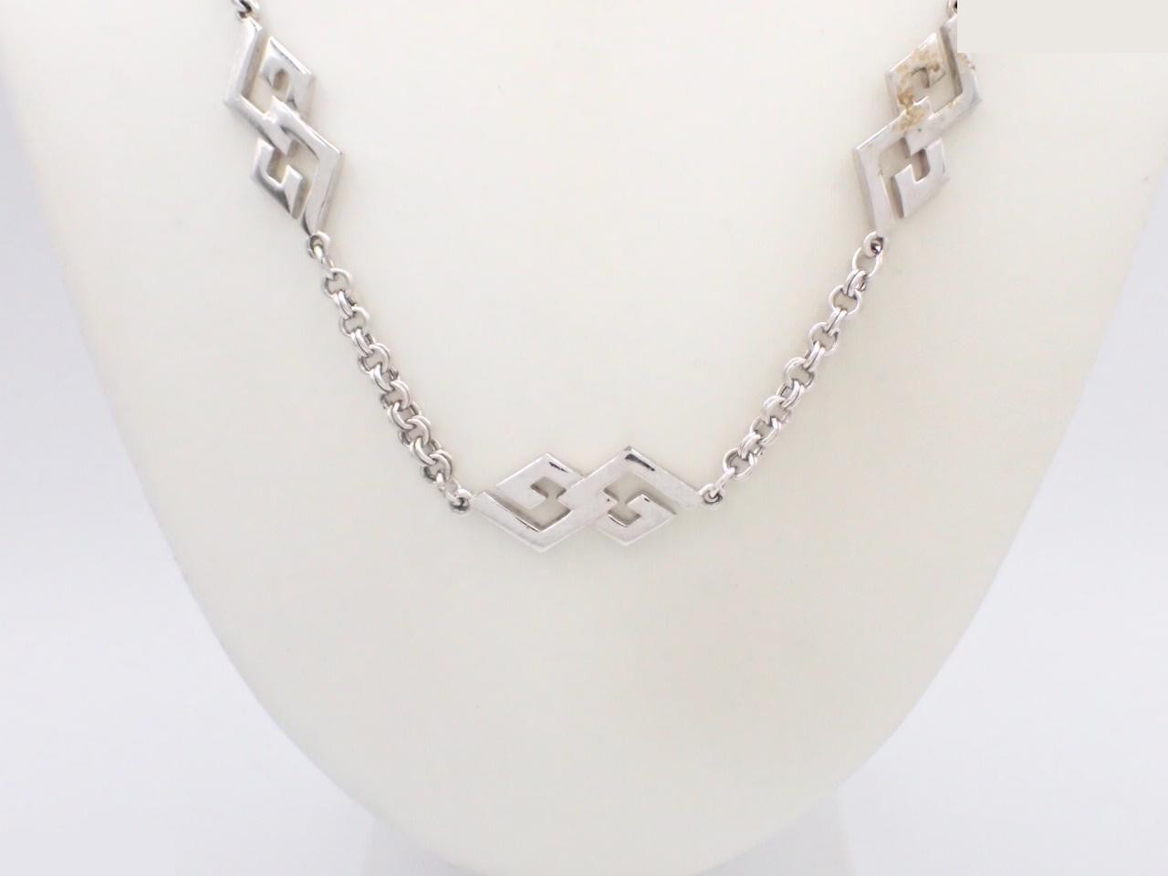 Long necklace with logo, silver color, 43.4g, box included.