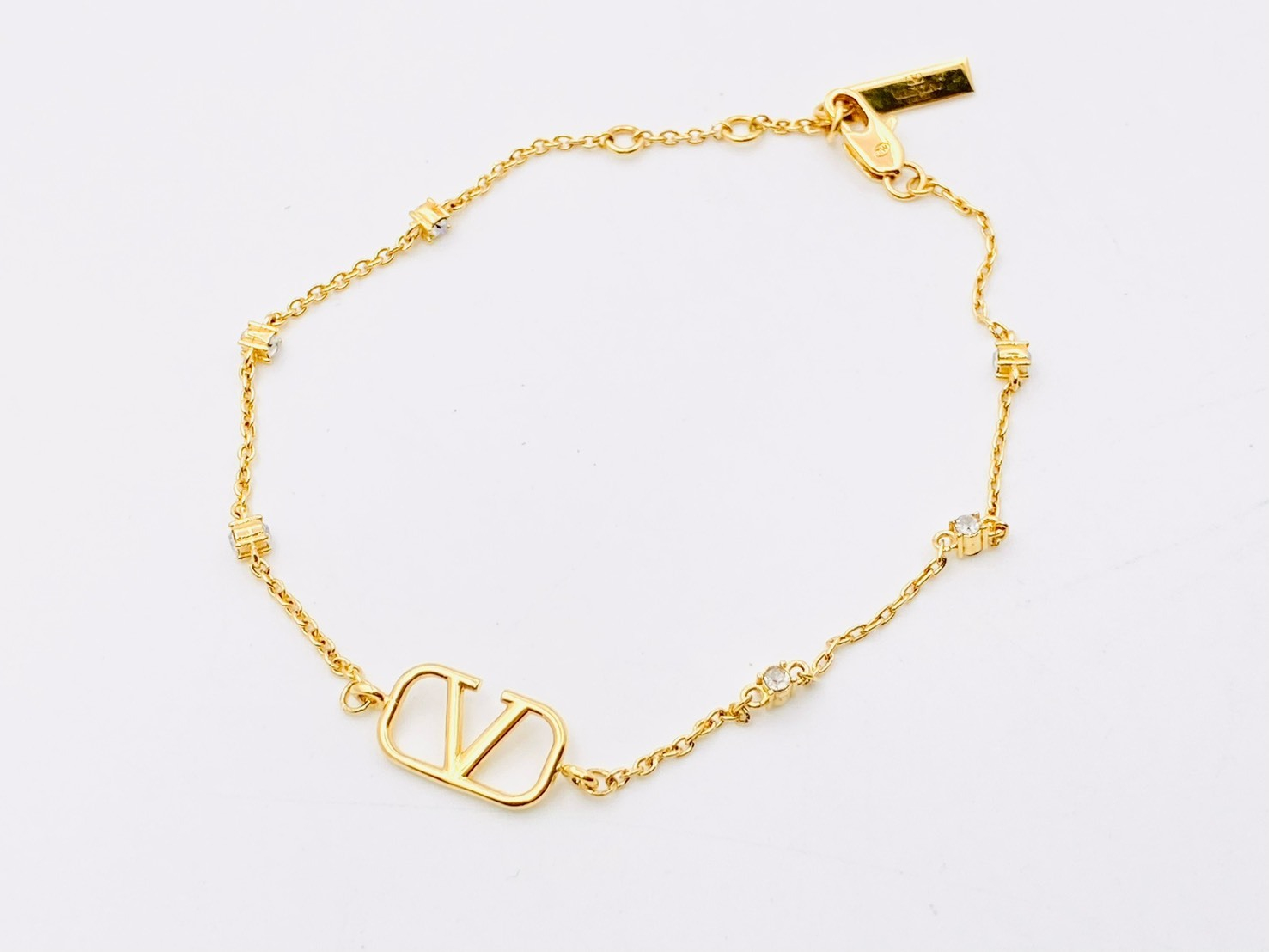 V-logo signature Swarovski crystal rhinestone bracelet, gold bracelet/bangle