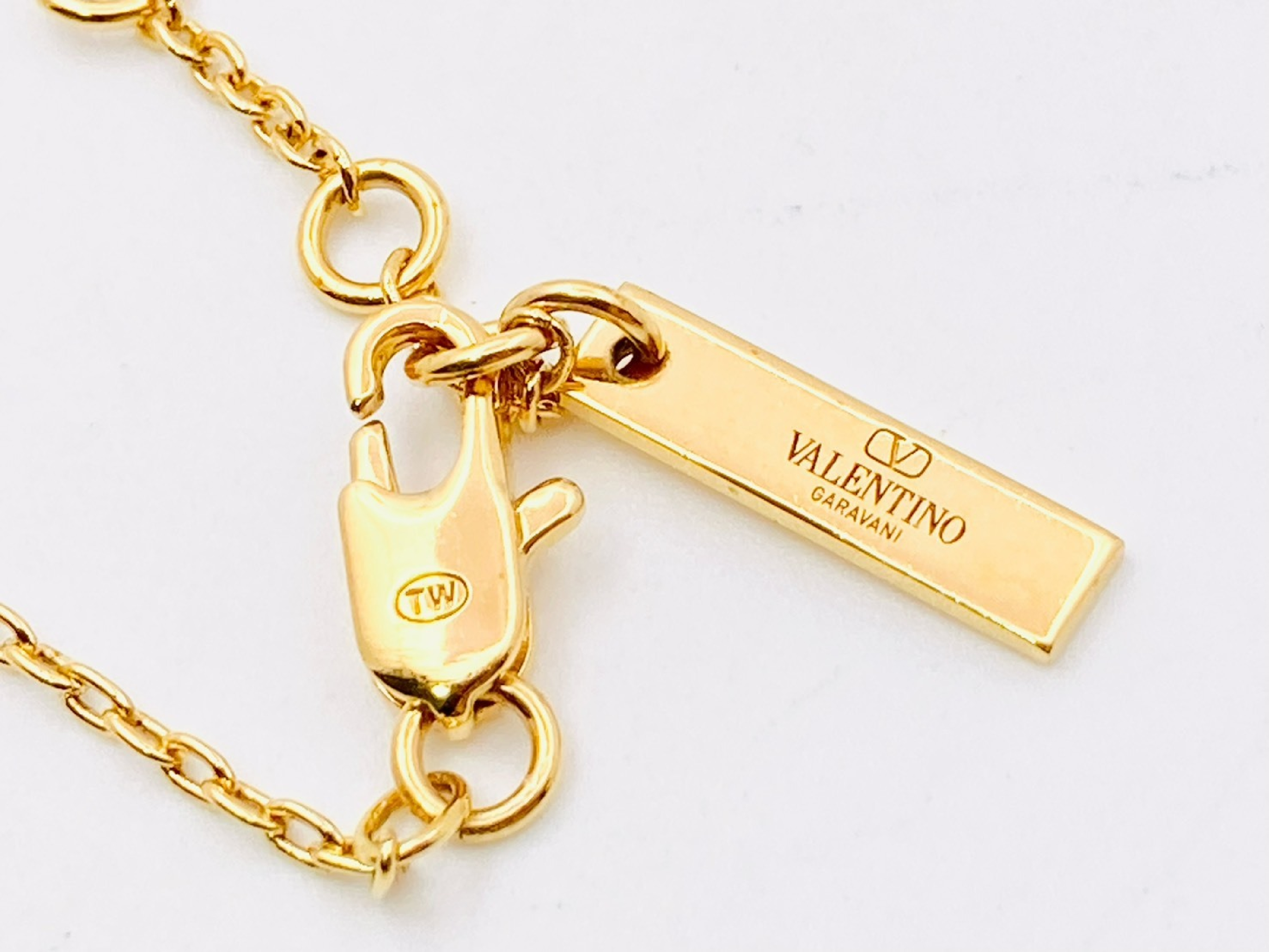 V-logo signature Swarovski crystal rhinestone bracelet, gold bracelet/bangle — view 3