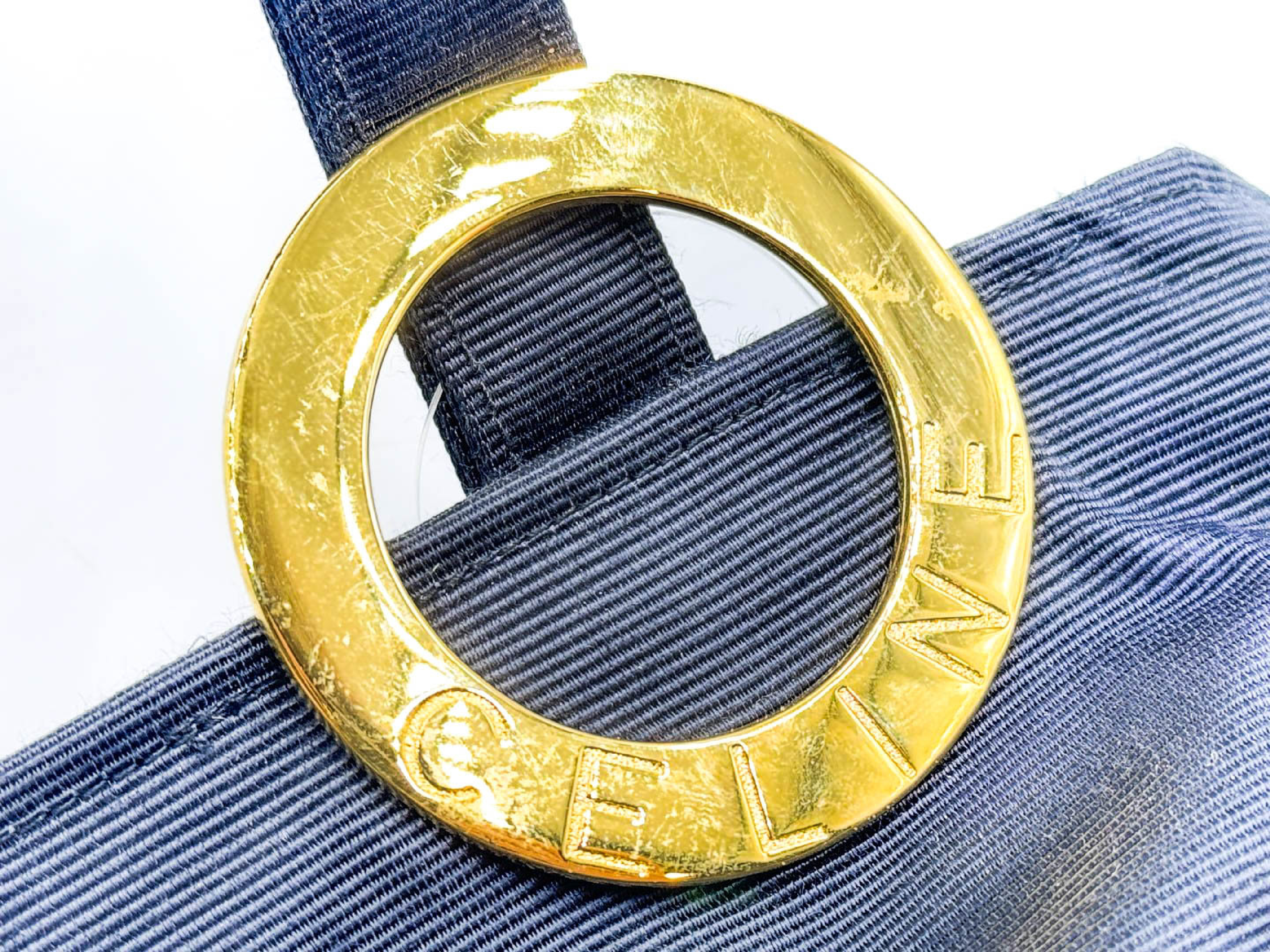 Circle clasp, gold hardware, black pouch — view 9