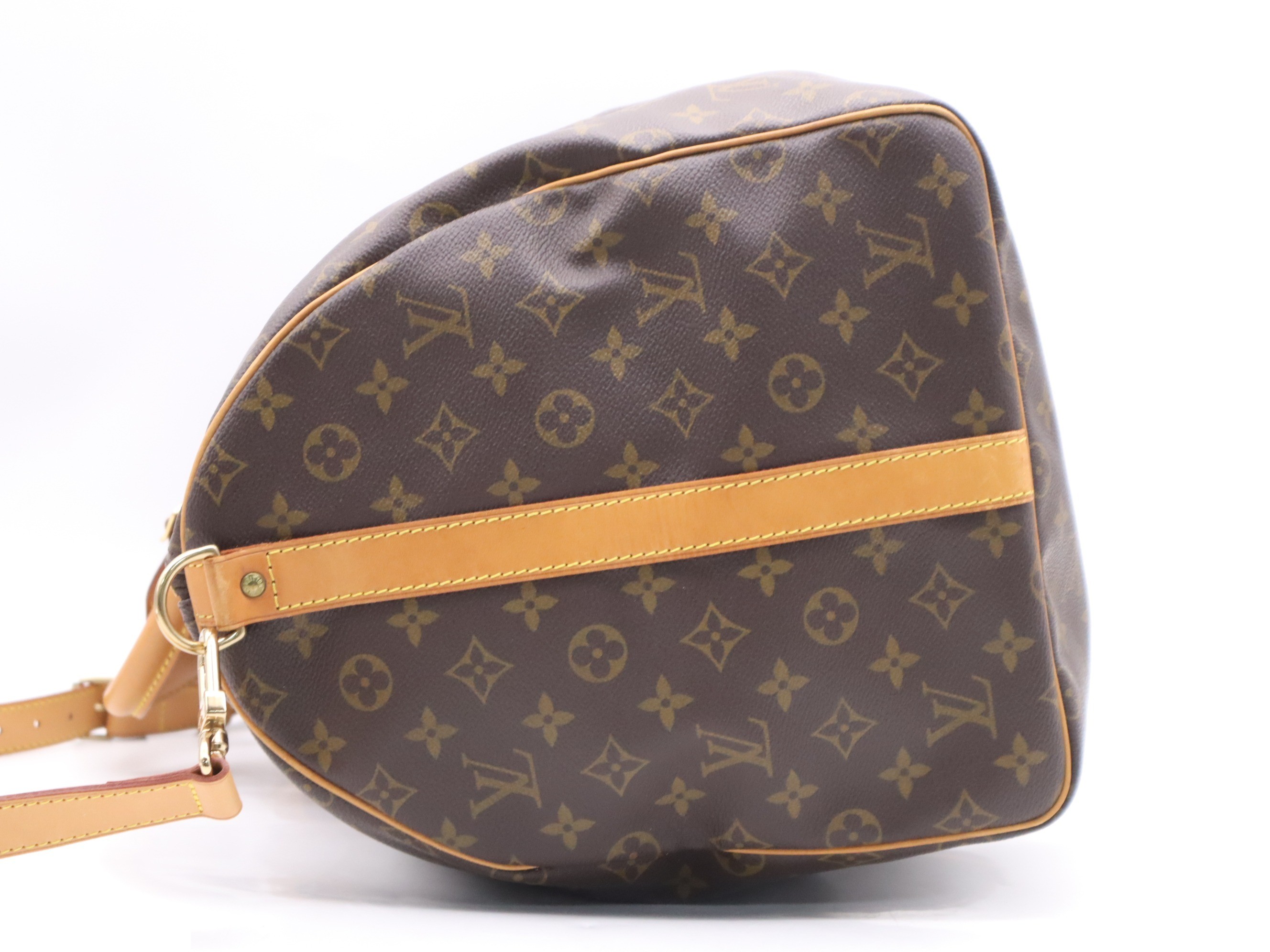 Keepall Bandoulière 55 with shoulder strap, name tag, and handle. — view 3