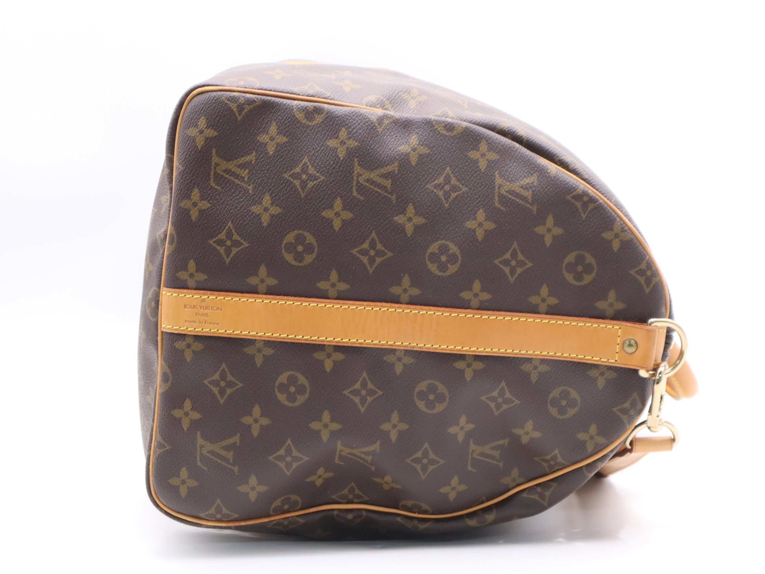 Keepall Bandoulière 55 with shoulder strap, name tag, and handle. — view 5