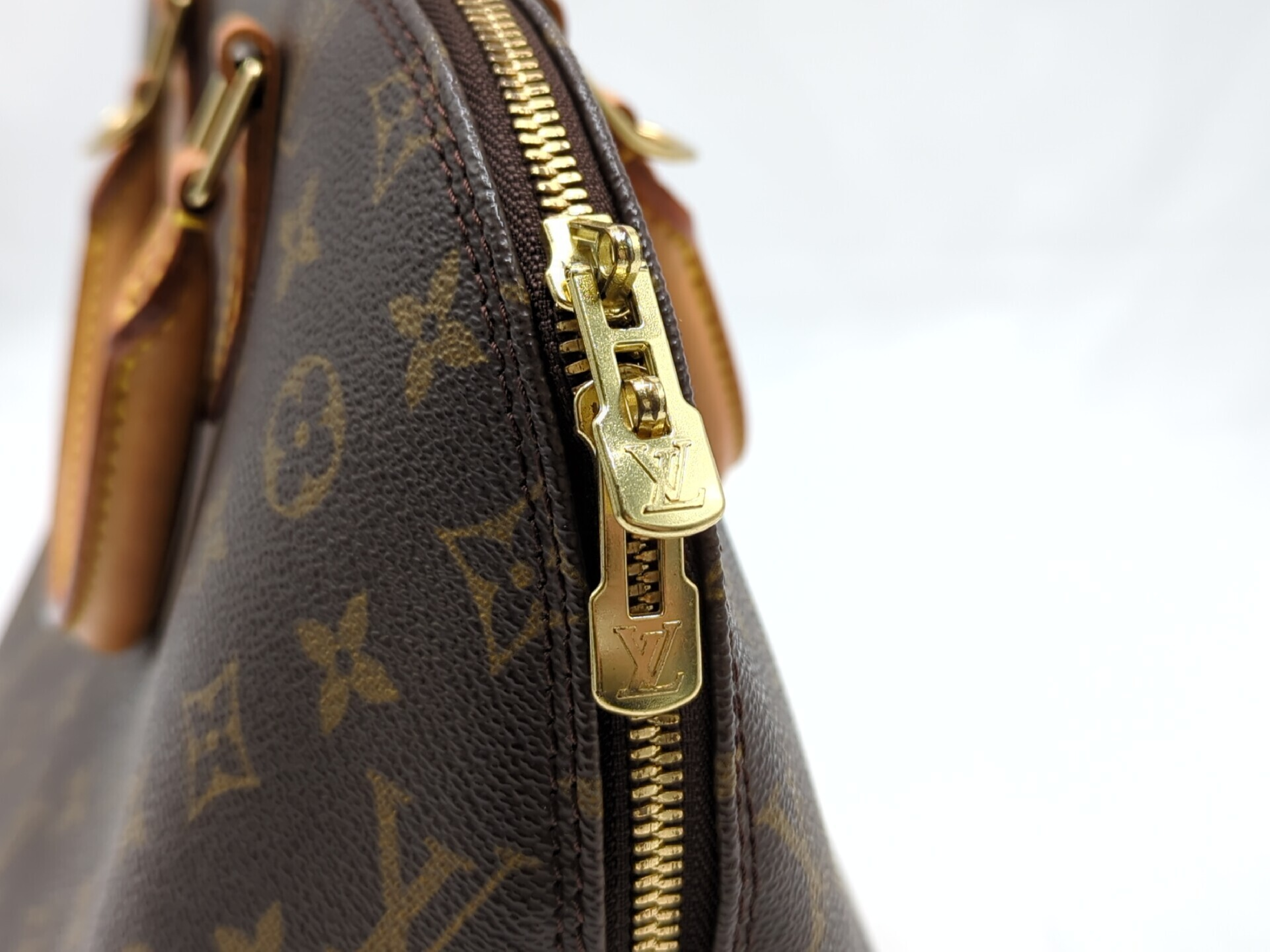 M51130 Monogram Alma Handbag — view 9