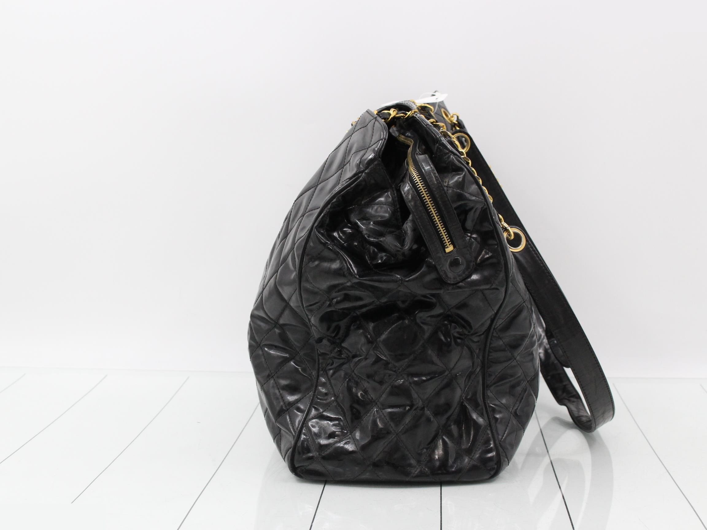 Supermodel patent leather chain tote bag, black and gold. — view 3