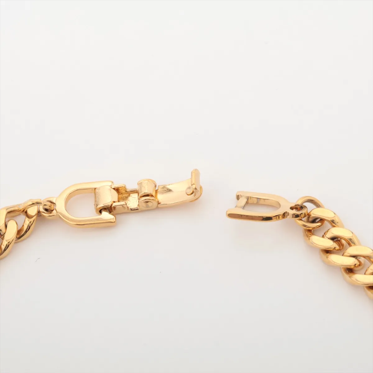 CD logo bracelet, gold plated with rhinestones. Shows signs of wear, including — view 4