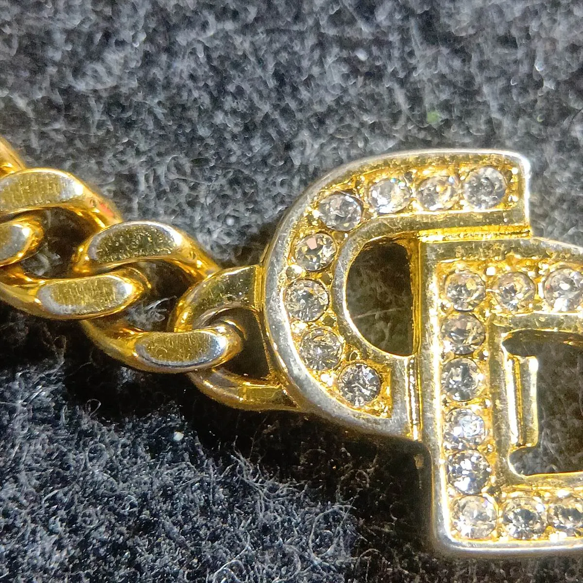 CD logo bracelet, gold plated with rhinestones. Shows signs of wear, including — view 7
