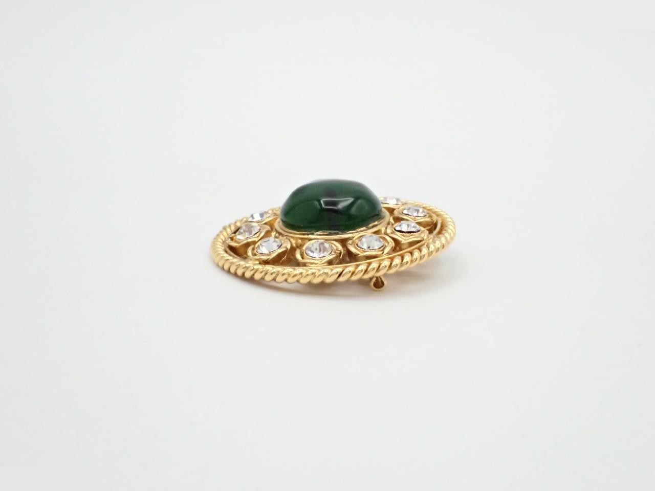 Green brooch with gold-plated stones and rhinestones. — view 3