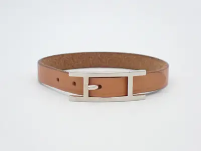 Leather bracelet, brand "Api", wrist circumference approximately 18cm