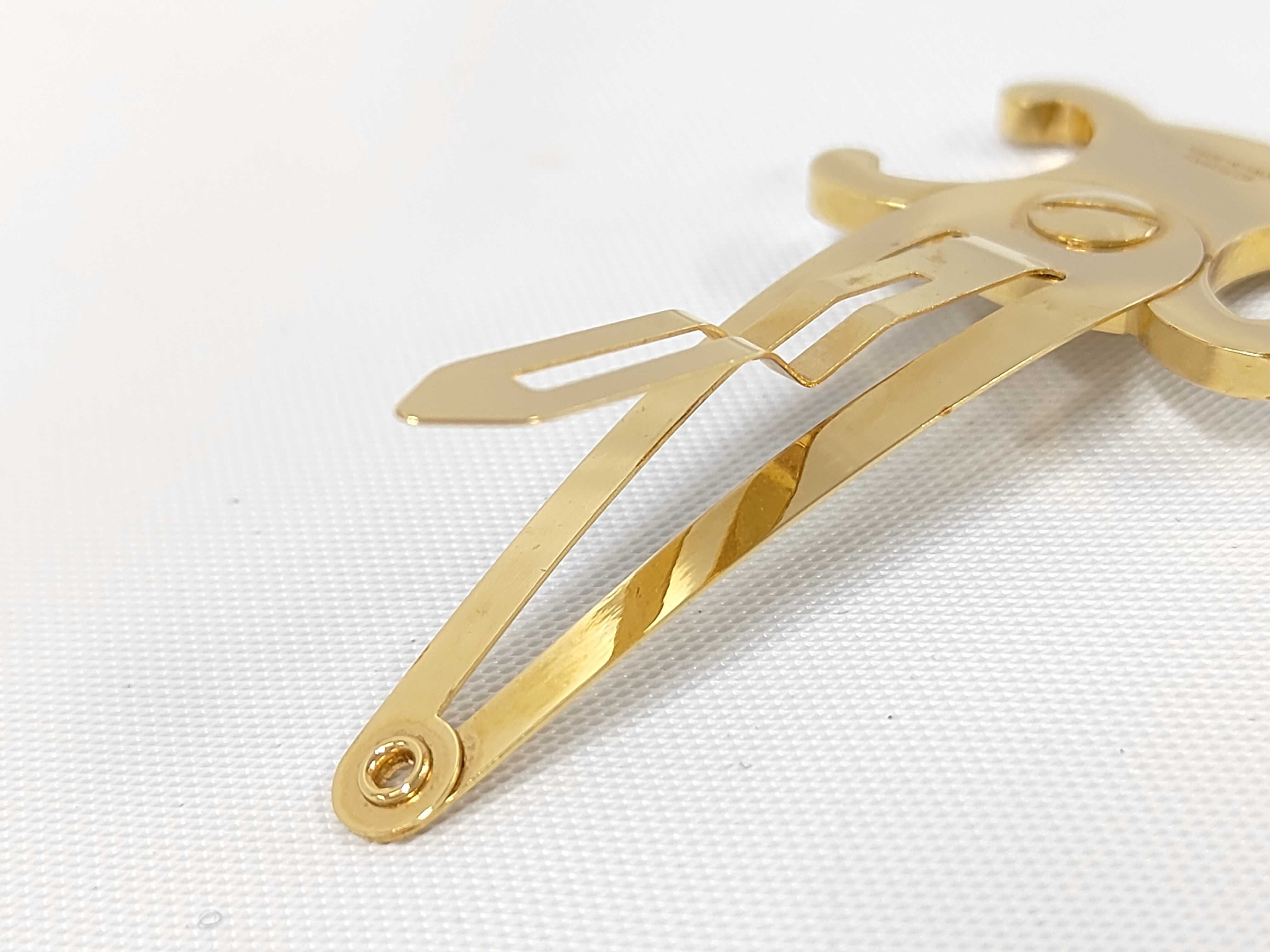 Triomphe Hair Clip. Includes: Box, dust bag, and hair accessory. — view 8